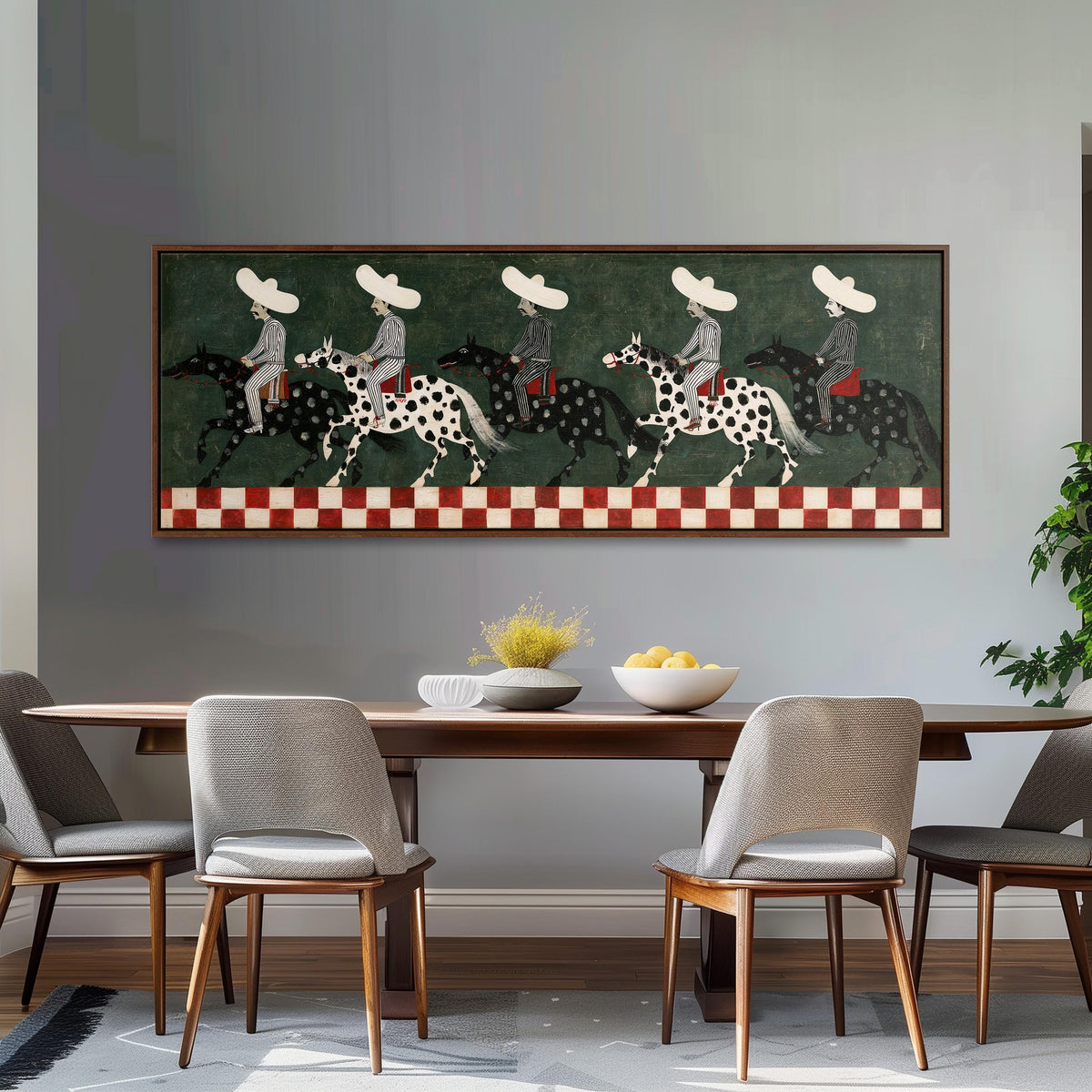 Riders in sombreros on spotted horses long horizontal canvas print above a dining table