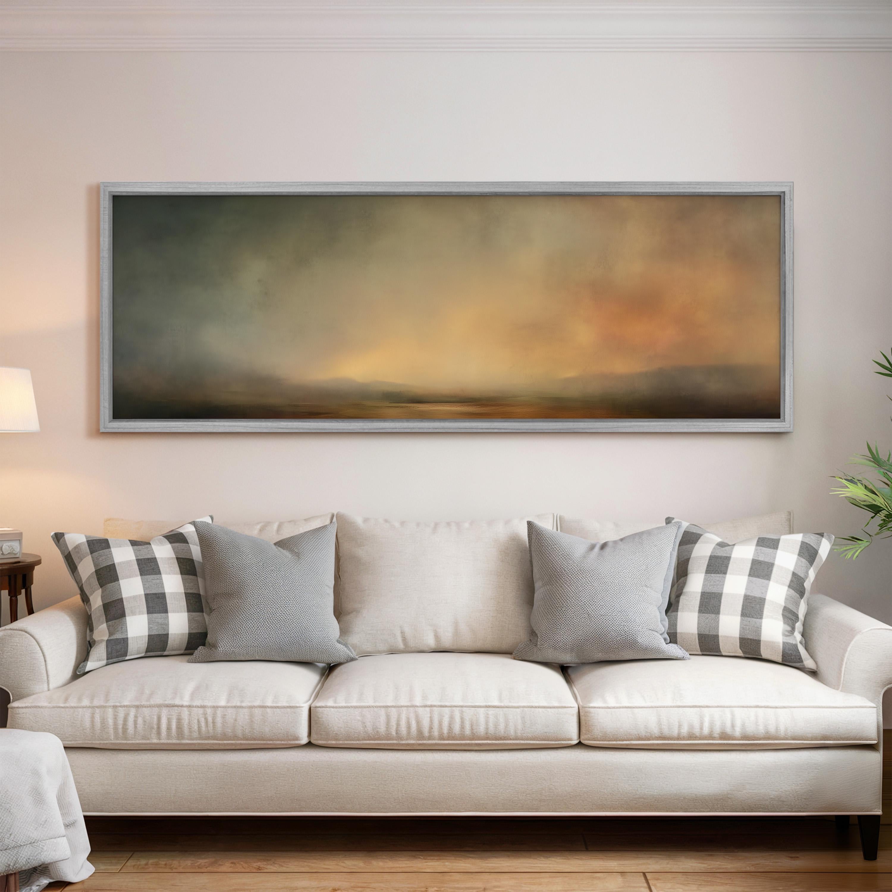 a large, rectangular painting hanging on a white wall above a white sofa with gray and white plaid throw pillows.