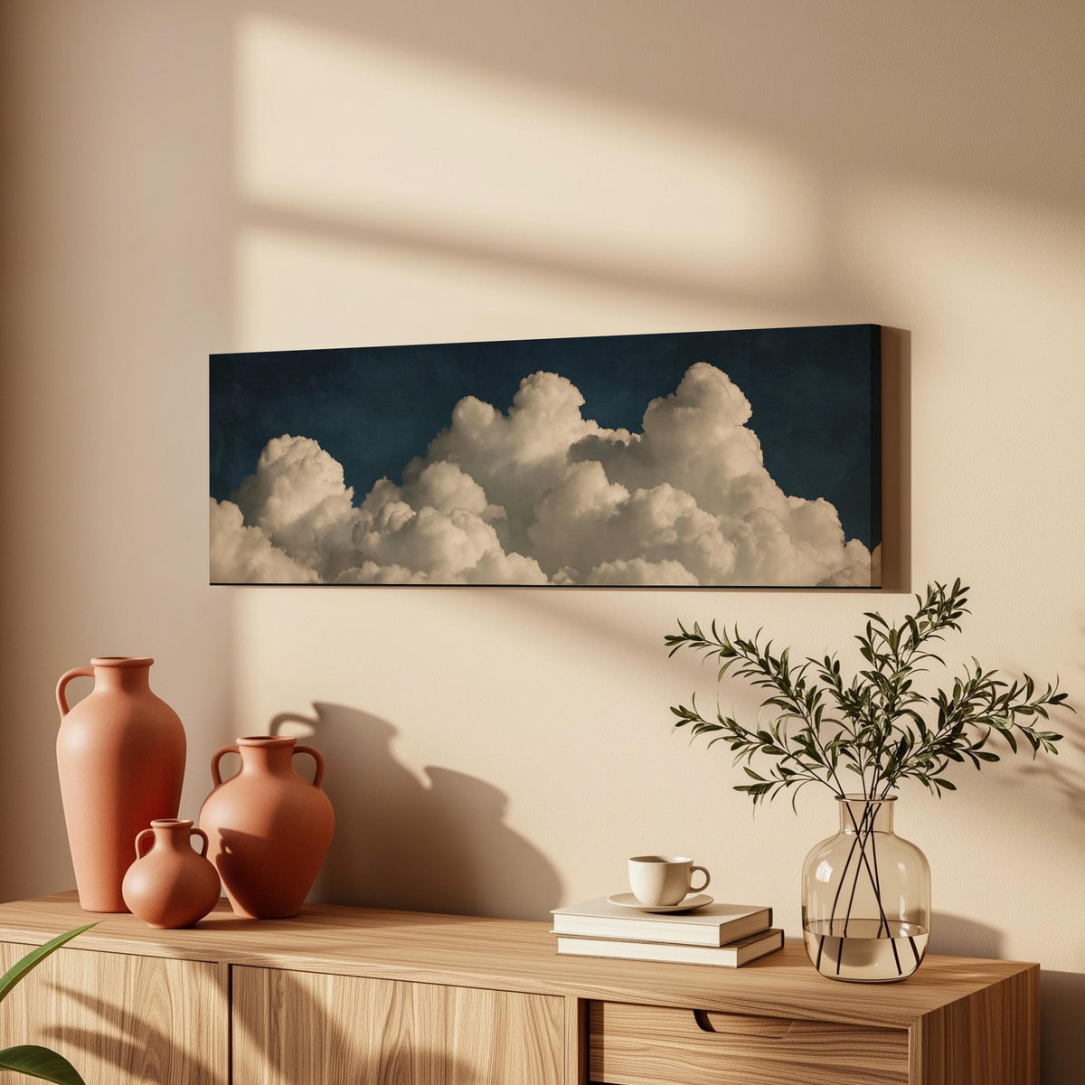 Cumulus clouds against a dark night sky long horizontal canvas print above a wooden sideboard
