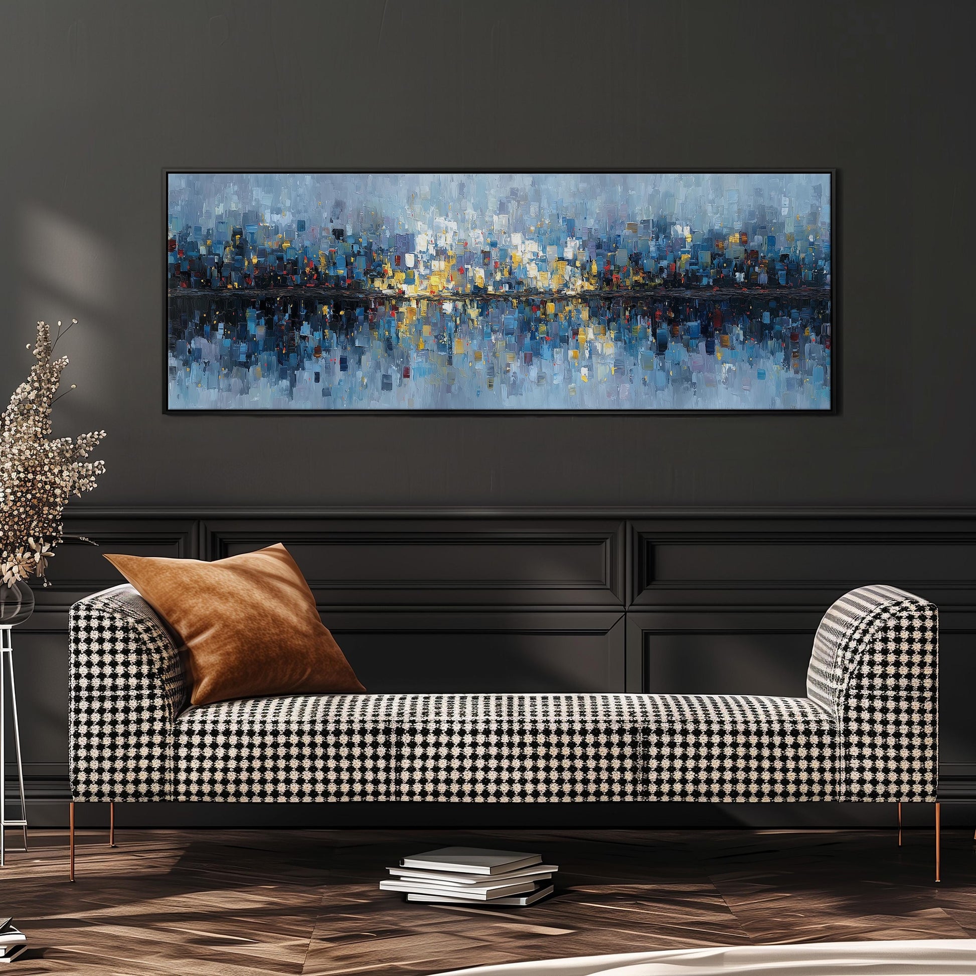 a large, colorful abstract painting hanging on a wall above a black and white checkered sofa in a modern living room setting.