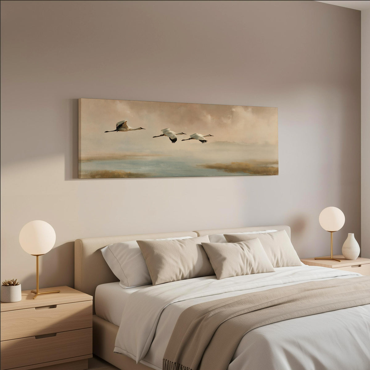 Cranes flying over a calm shore at dusk wide panoramic canvas print above a bed in a neutral bedroom