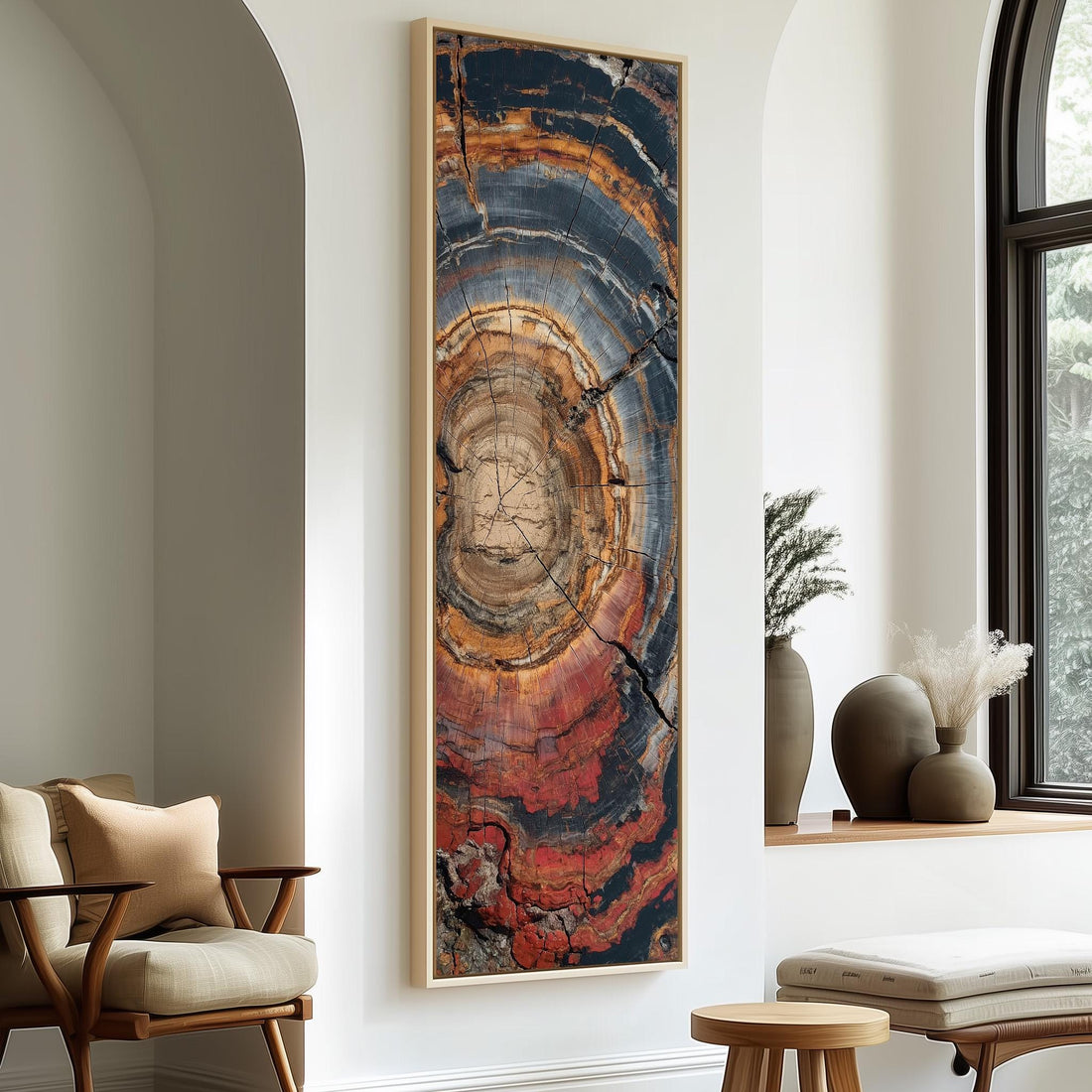 a large, colorful abstract painting hanging on a white wall in a modern living room setting.