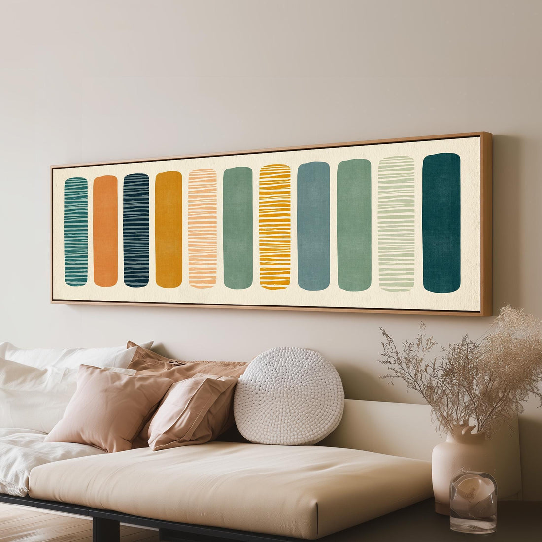 Striped fabric swatches in earthy colors long horizontal canvas print above a sofa in a living room