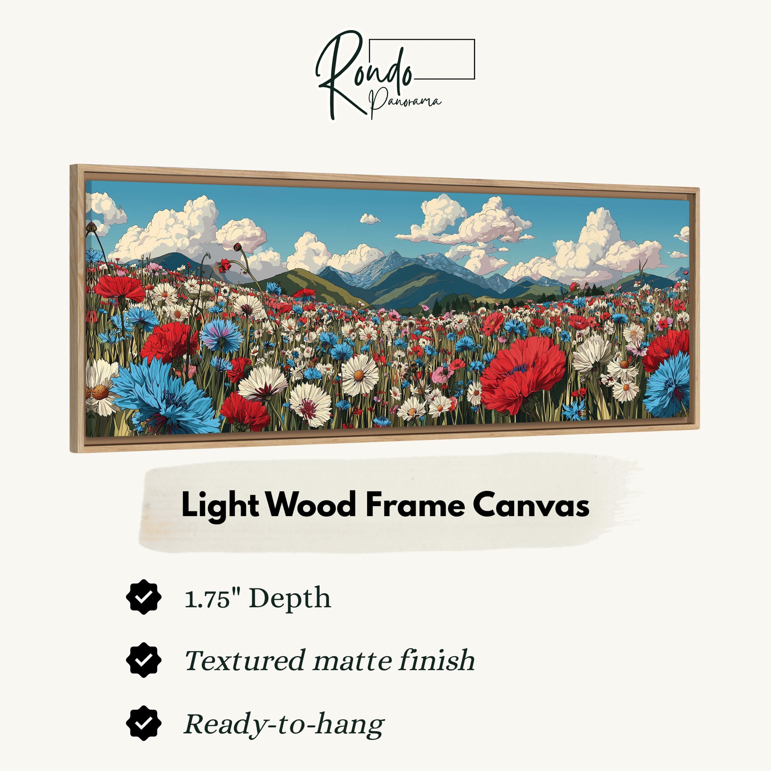 The image is a light wood frame canvas depicting a vibrant field of flowers with mountains in the background.