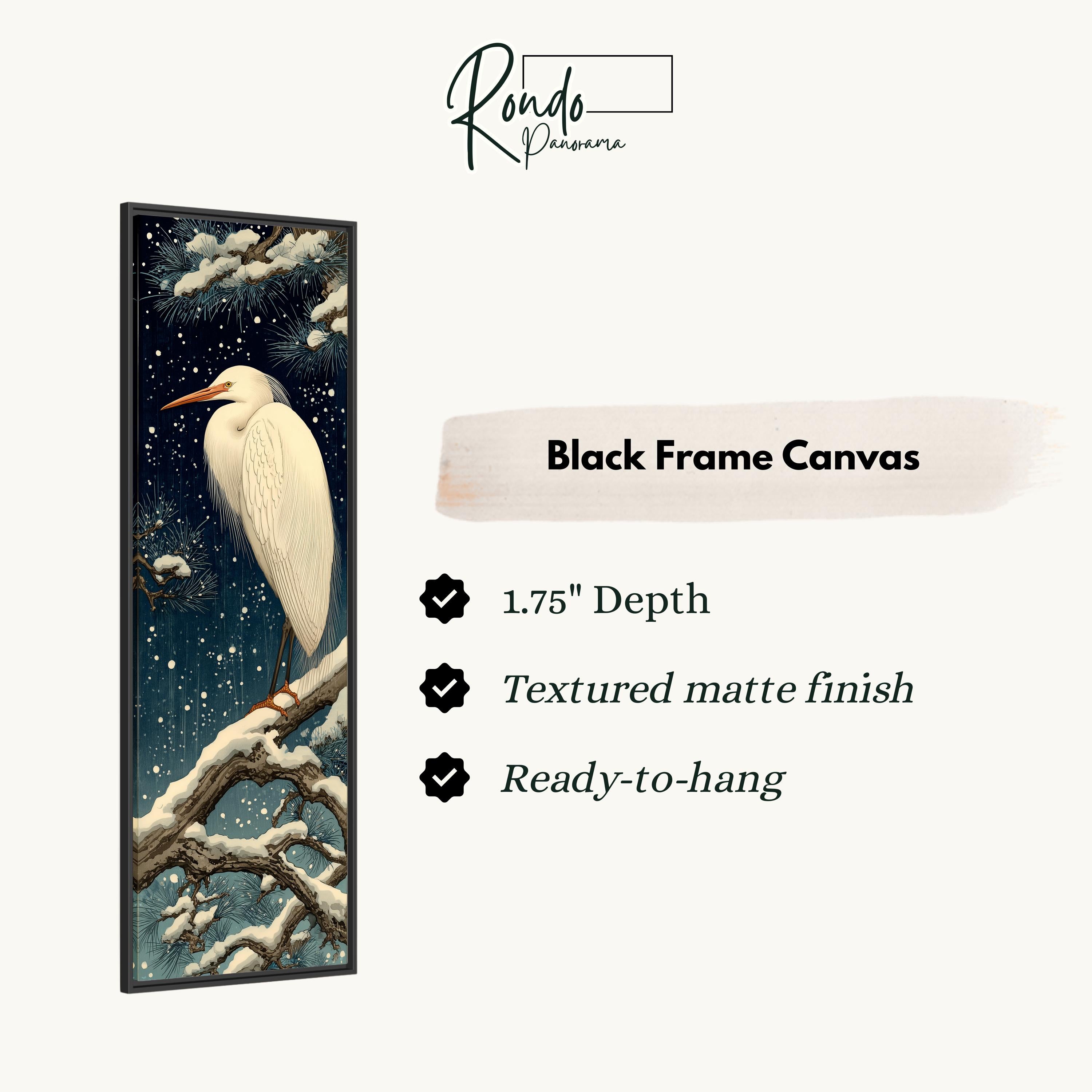 The image is a black frame canvas depicting a white heron standing on a branch with snow.