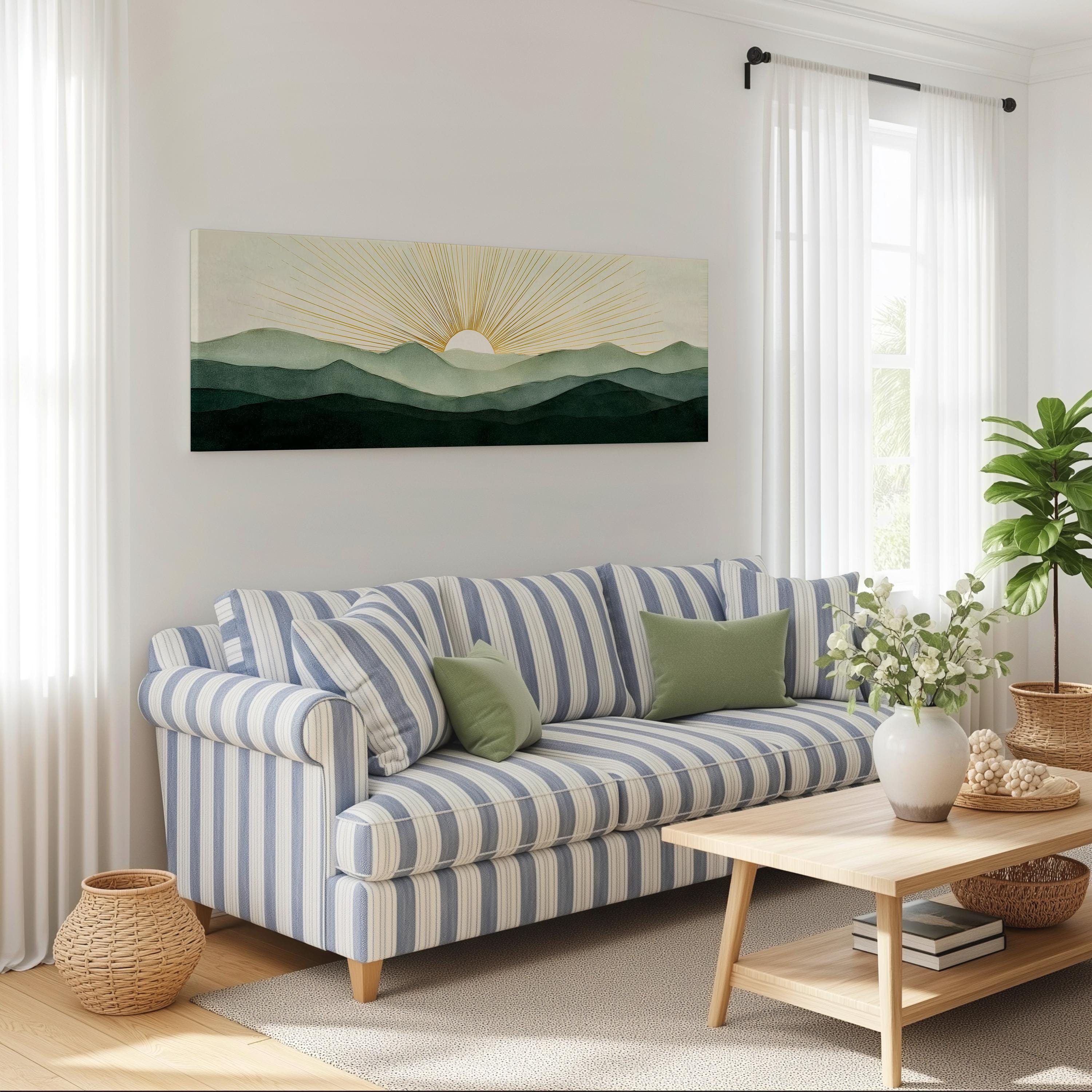 a cozy living room with a striped blue and white sofa, a wooden coffee table, and a large window with white curtains. Above the sofa, there is a large painting of a sunrise over mountains.