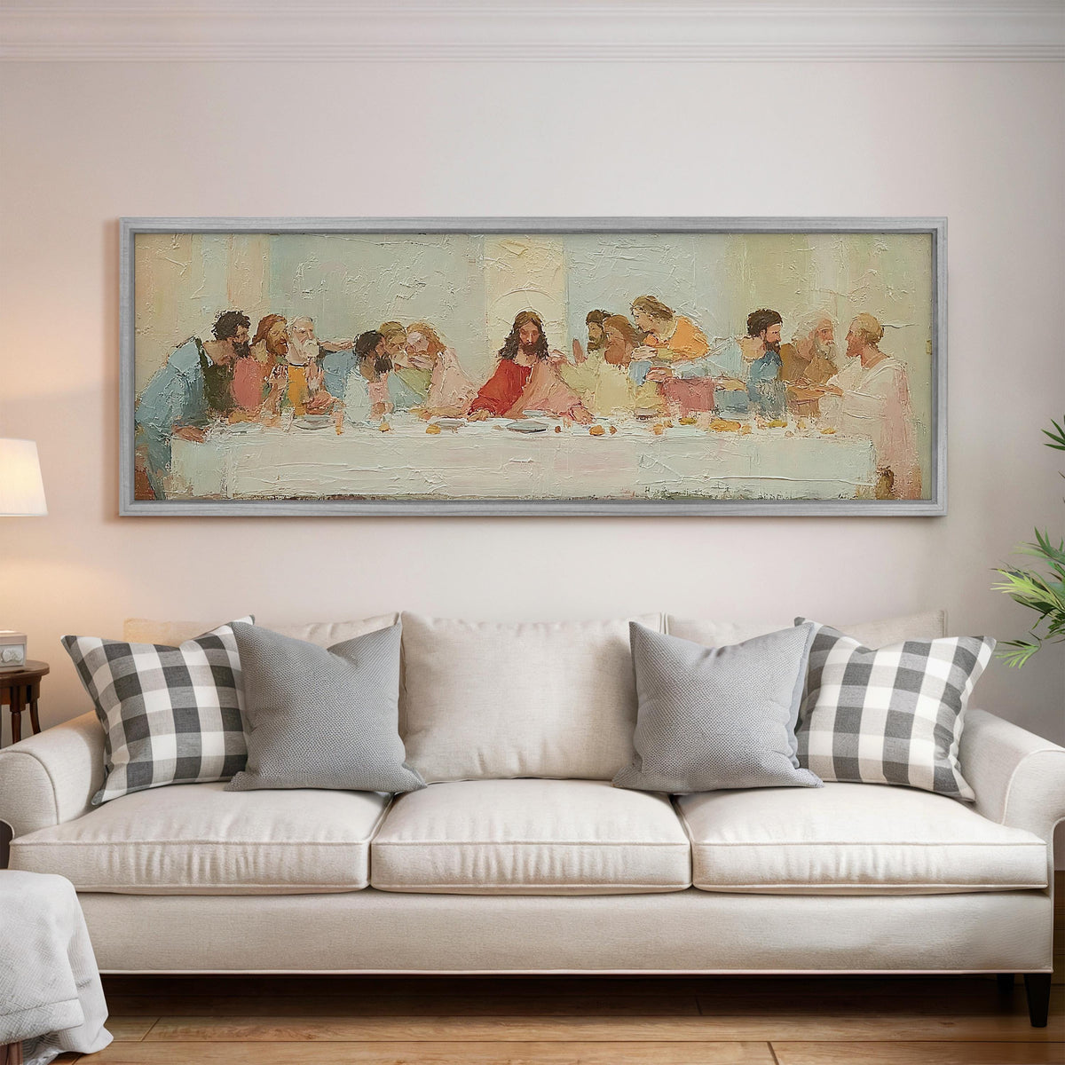 The Last Supper in a classic style panoramic canvas print above a white sofa in a bright living room