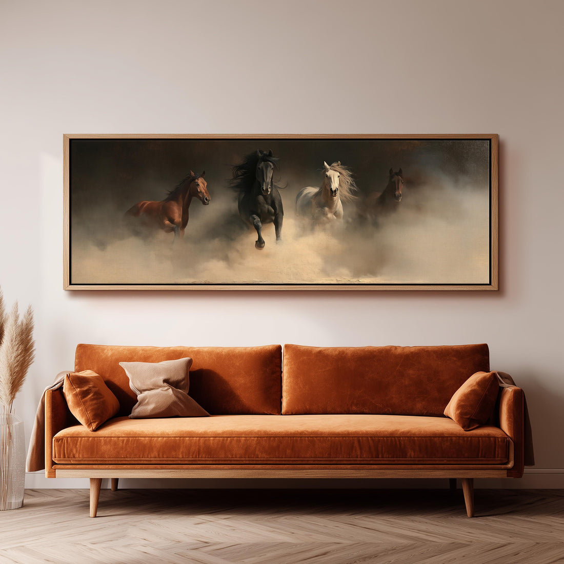 Wild horses running out of the dust long horizontal canvas print above a sofa in a living room