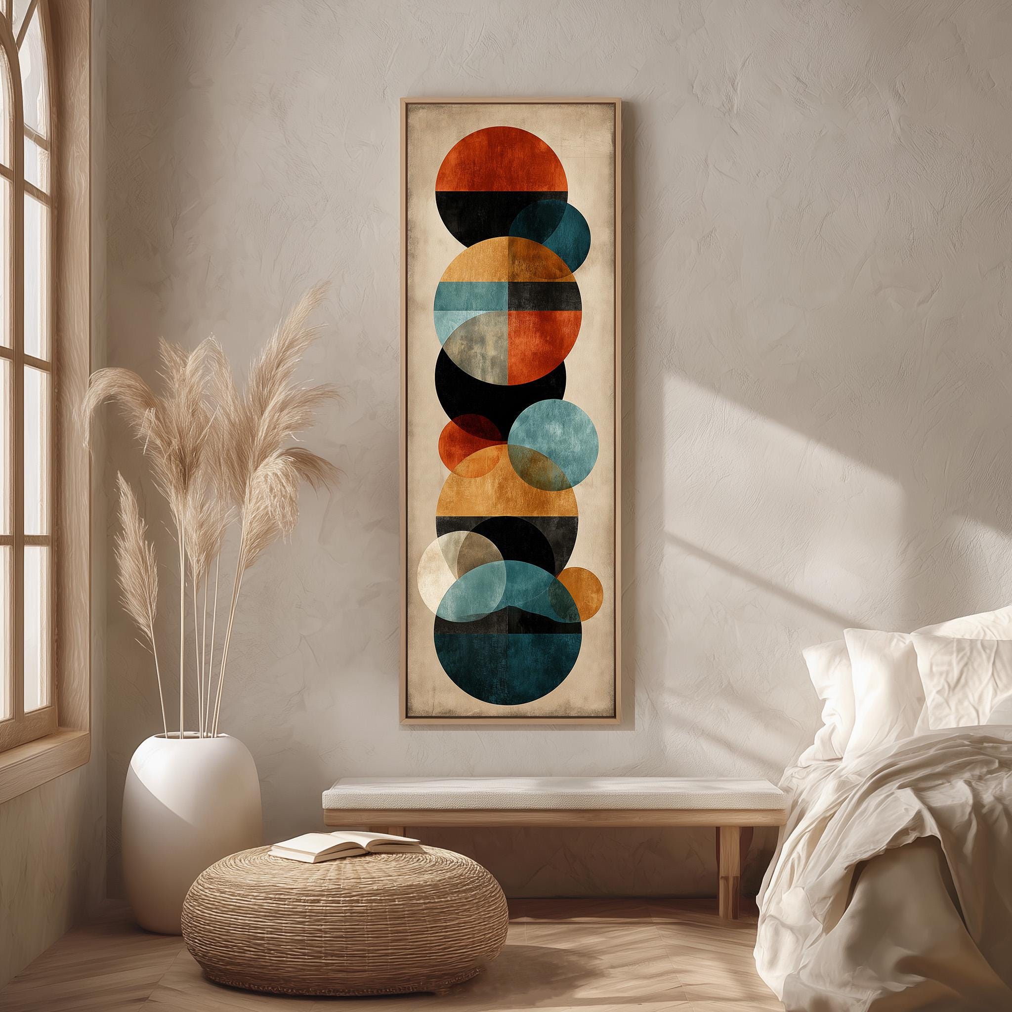 a modern art piece with a geometric design of circles and other shapes, hanging on a wall in a minimalist bedroom setting.