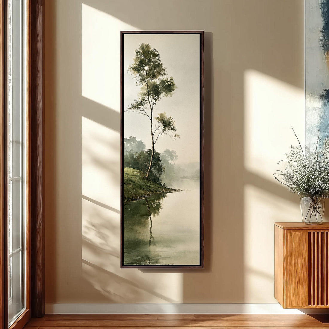 Lone tree by a misty lake long vertical canvas print in a sunlit living space