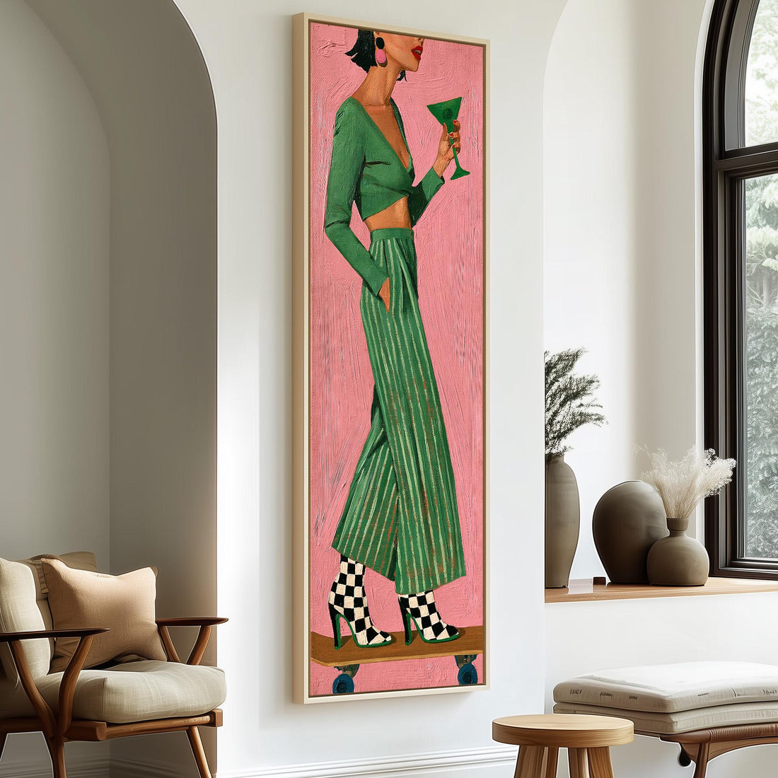 Woman in a green striped suit holding a cocktail long vertical canvas print in a sunlit living space