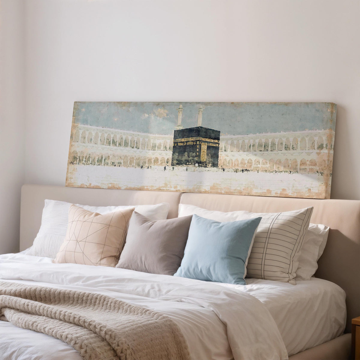 The Kaaba in the Grand Mosque courtyard wide panoramic canvas print above a bed in a bedroom