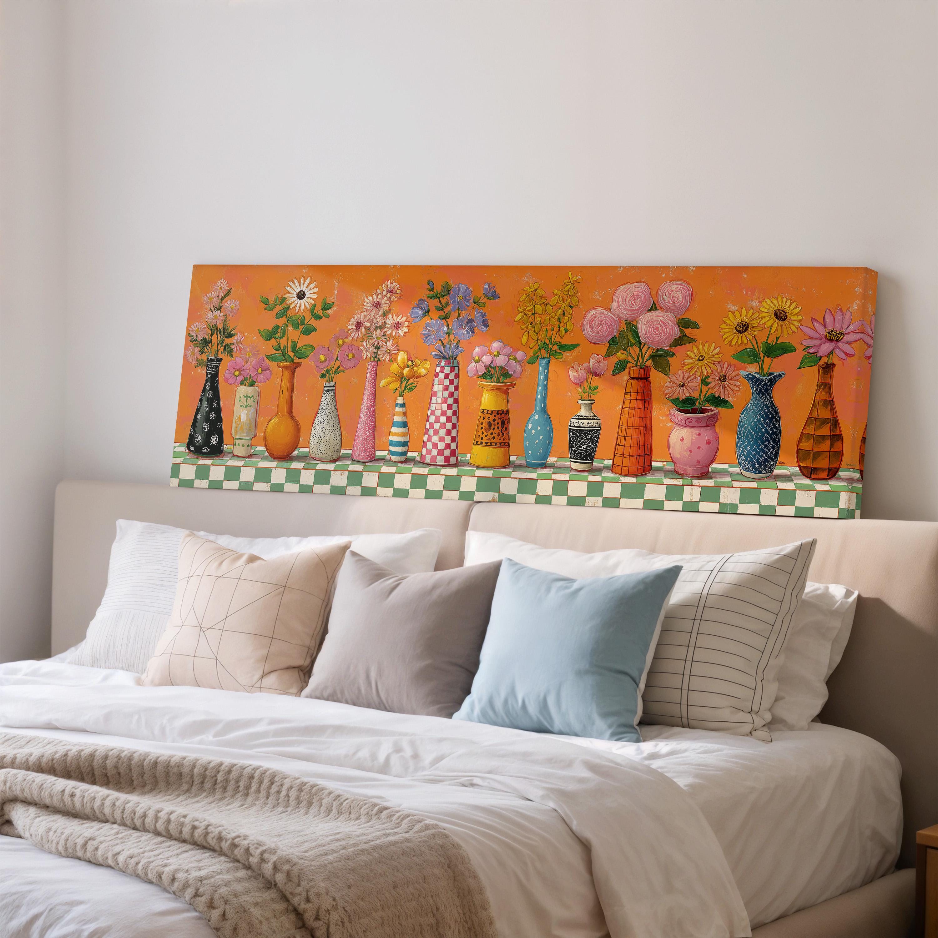 a bedroom with a bed and a colorful painting of vases on the wall above it.