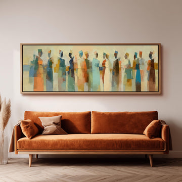 a large abstract painting hanging on a wall above a brown sofa.