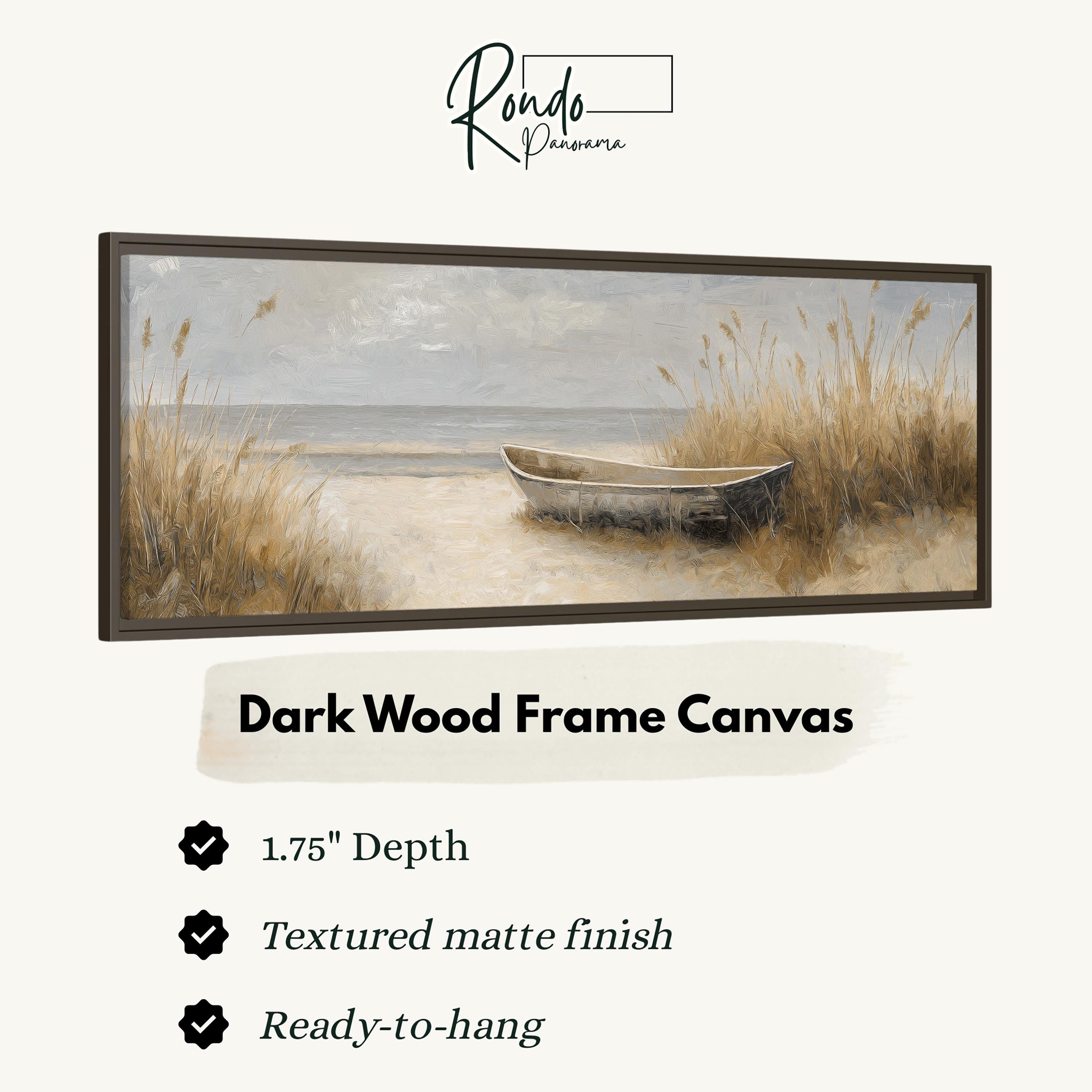 The image is a painting of a boat on the beach, with a dark wood frame.