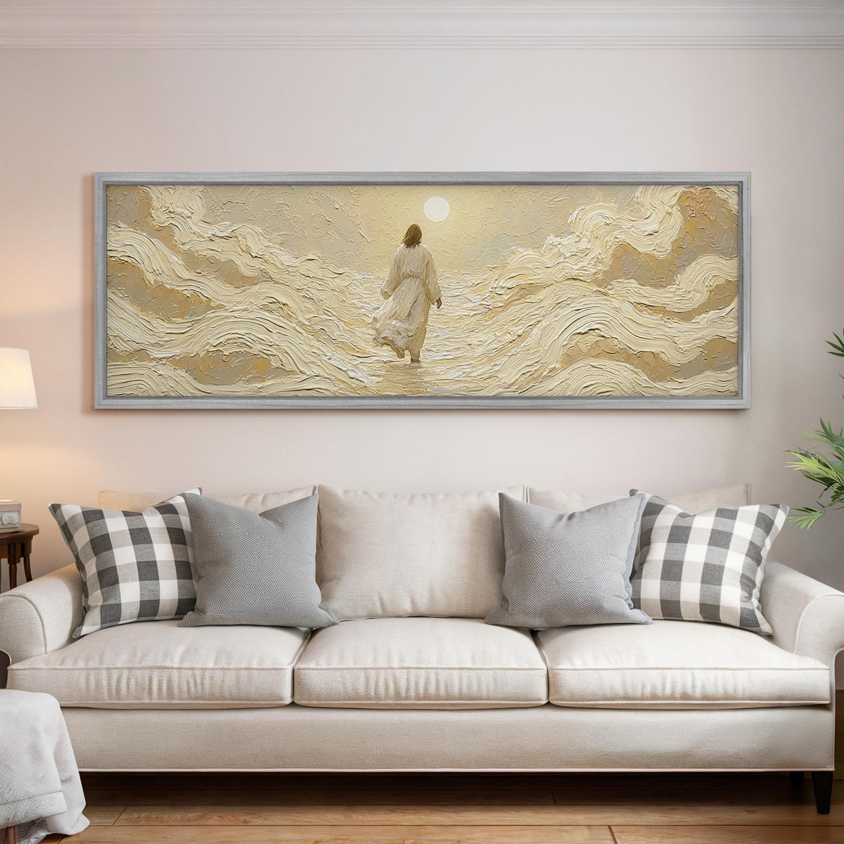 Jesus walking on golden waves panoramic canvas print above a white sofa in a bright living room