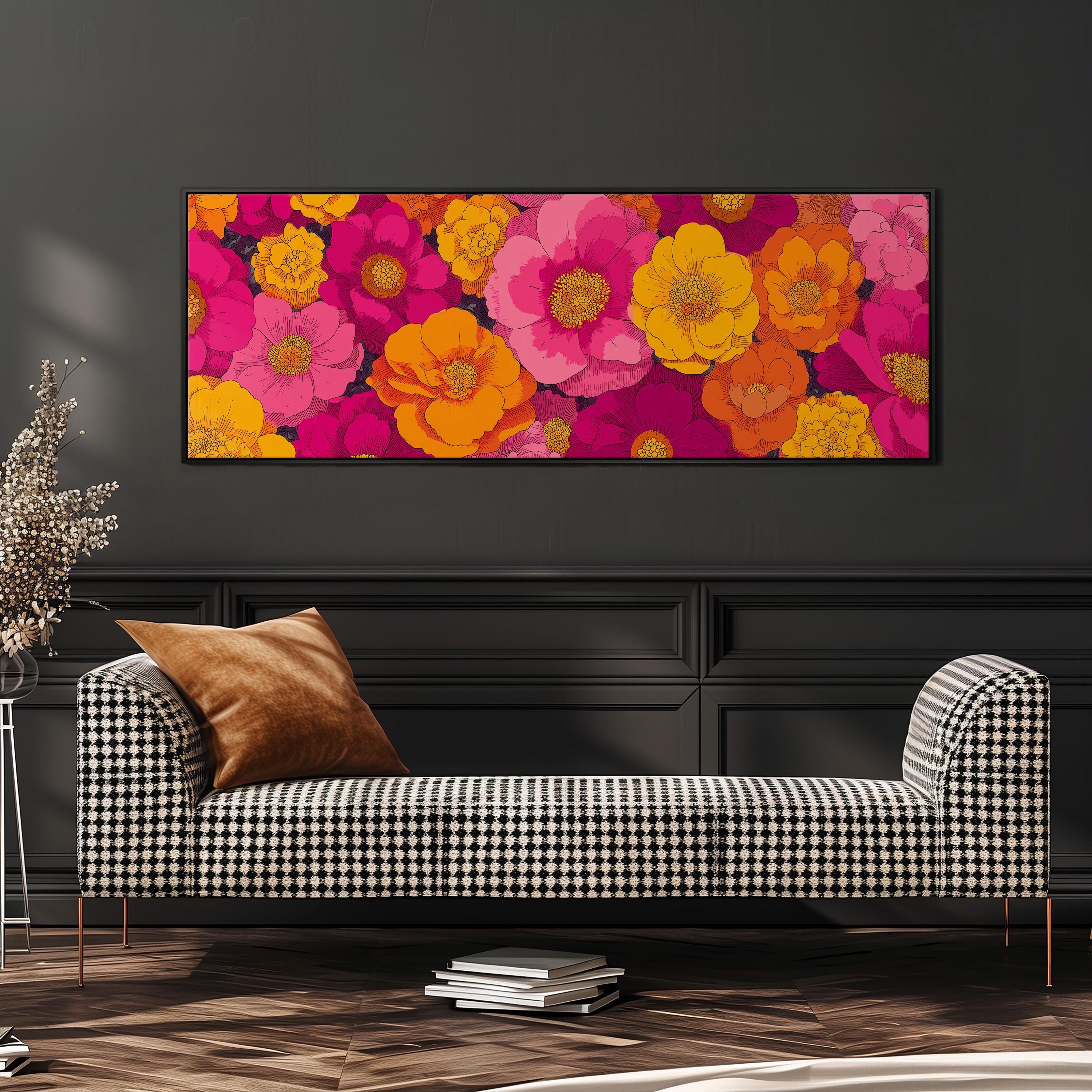 a large, colorful floral print hanging on a wall above a black and white checkered sofa.