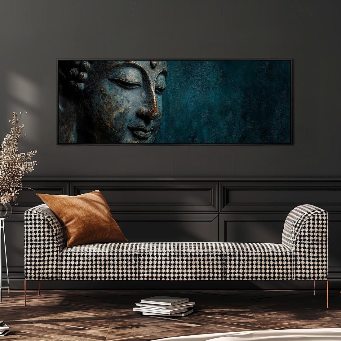 a large, framed painting of a Buddha's face on a dark background, hanging on a wall above a black and white checkered sofa.