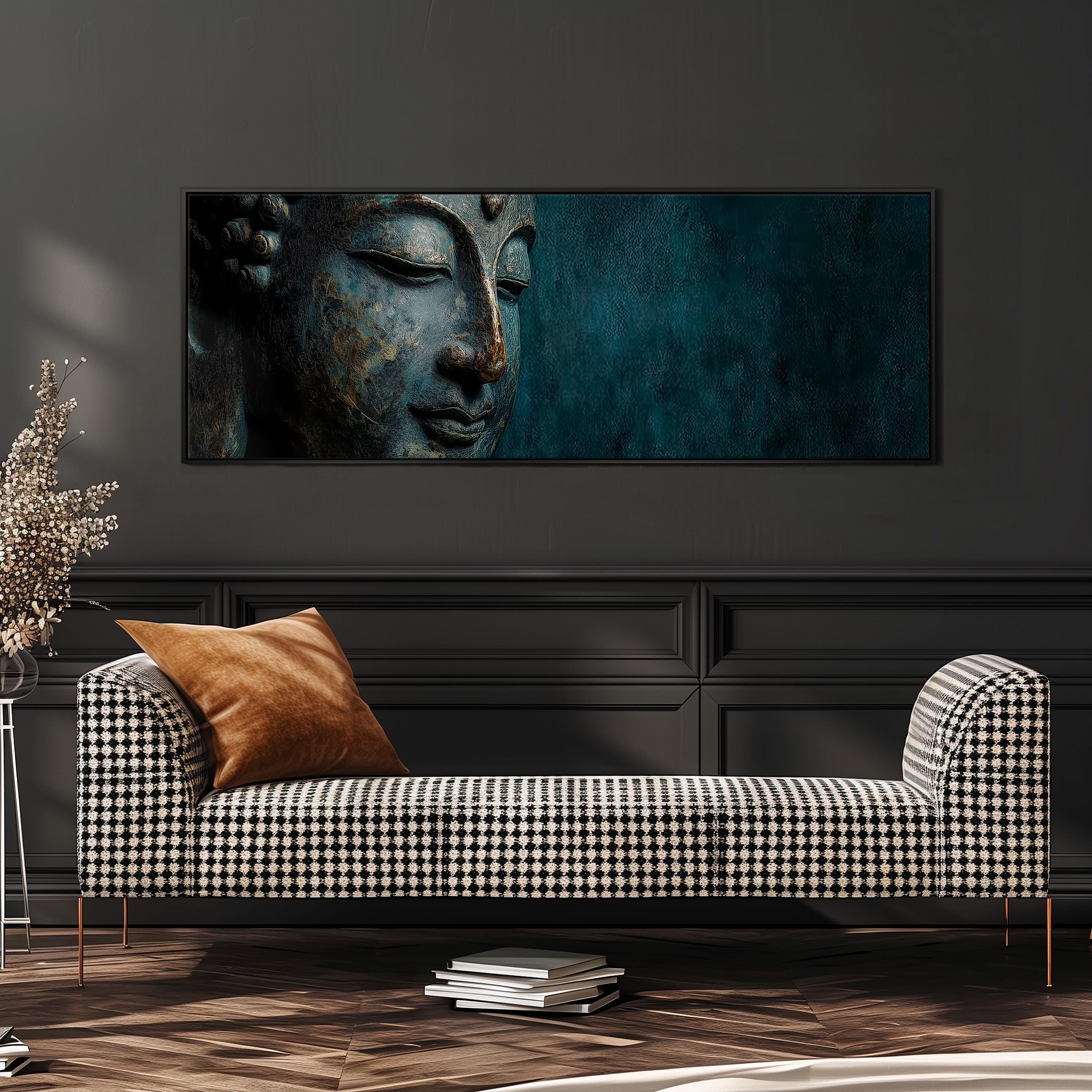 a large, framed painting of a Buddha's face on a dark background, hanging on a wall above a black and white checkered sofa.