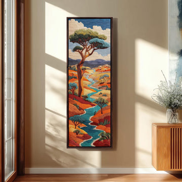 a large, colorful painting of a landscape with a winding river, trees, and mountains. The painting is hanging on a wall in a room with a wooden cabinet and a vase of flowers.