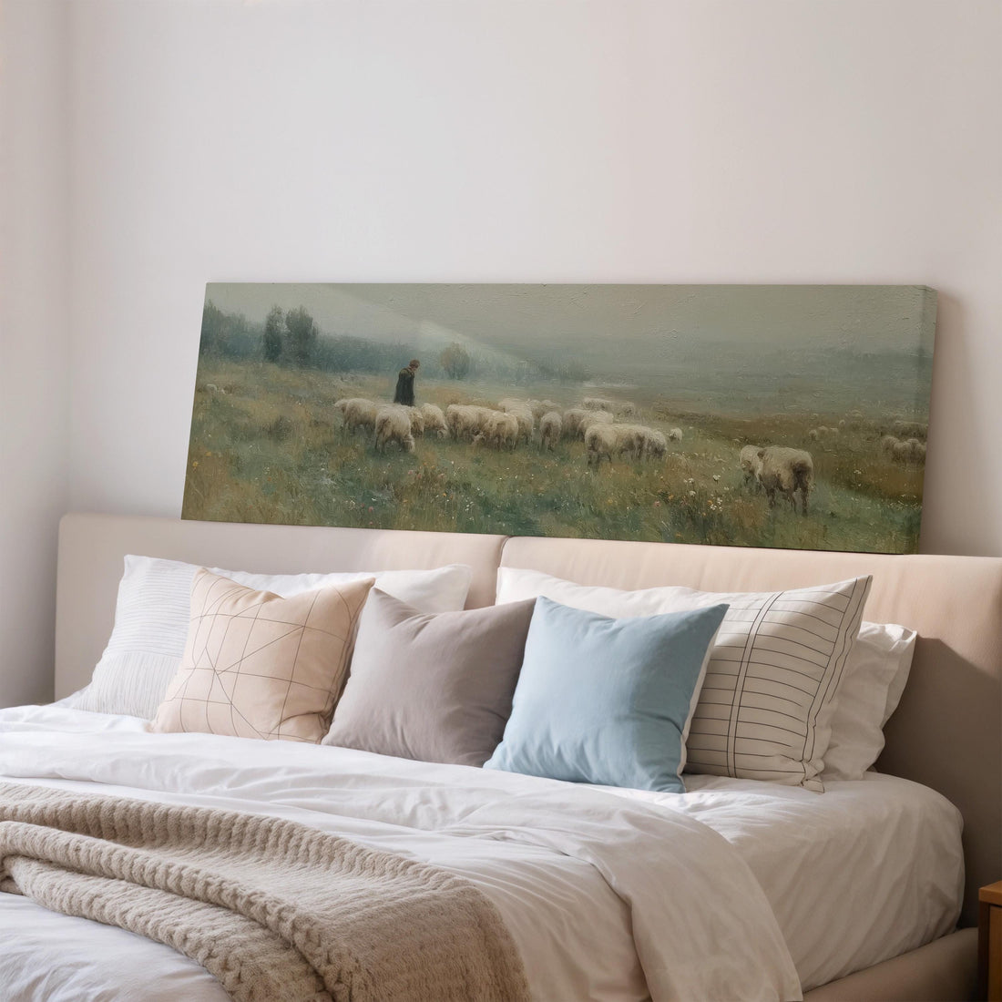 a large painting of a pastoral scene with a shepherd tending to his flock of sheep in a grassy field.