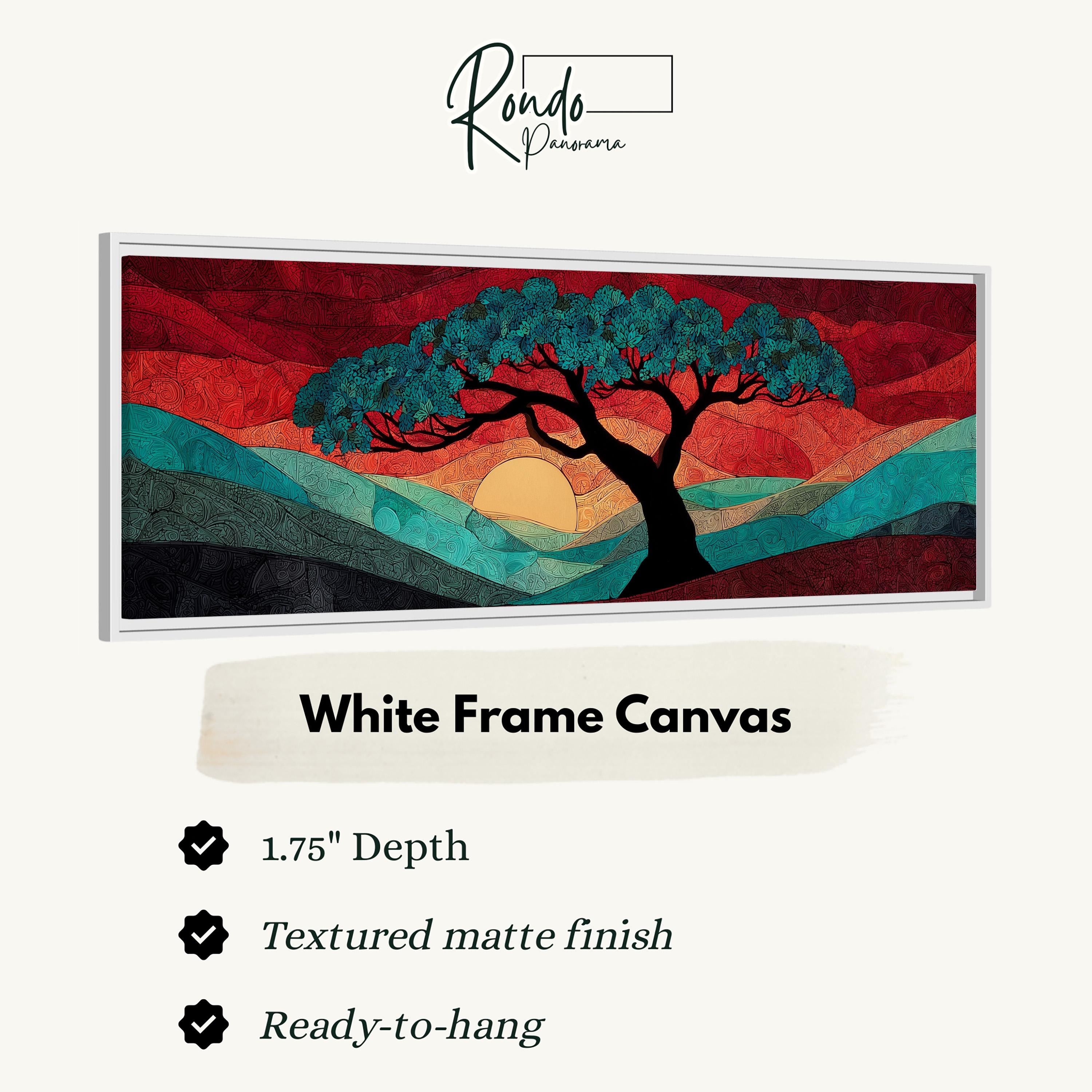The image is a framed artwork depicting a tree with a sunset landscape in the background.