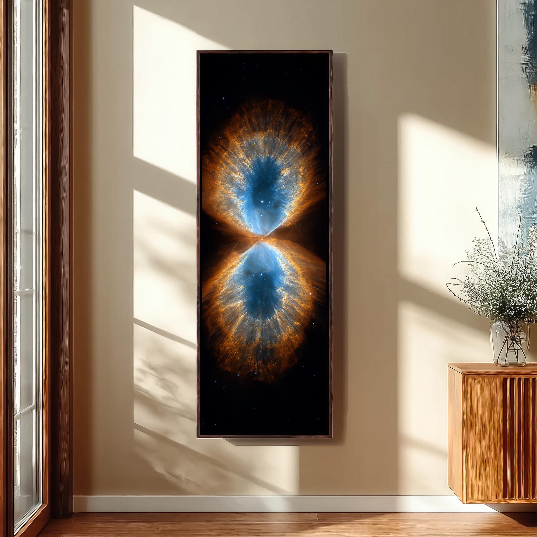 a large framed artwork depicting a vibrant, colorful nebula or cosmic phenomenon, hanging on a wall in a room with natural light streaming in from a window.