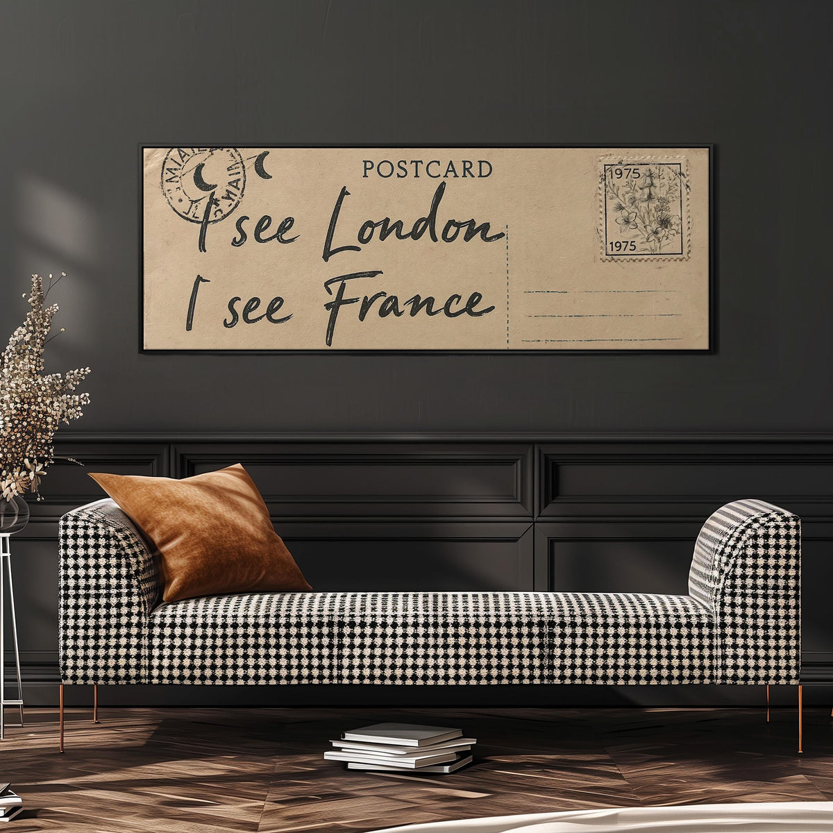 Postcard saying I see London, I see France wide panoramic canvas print above a bench in a dark living room