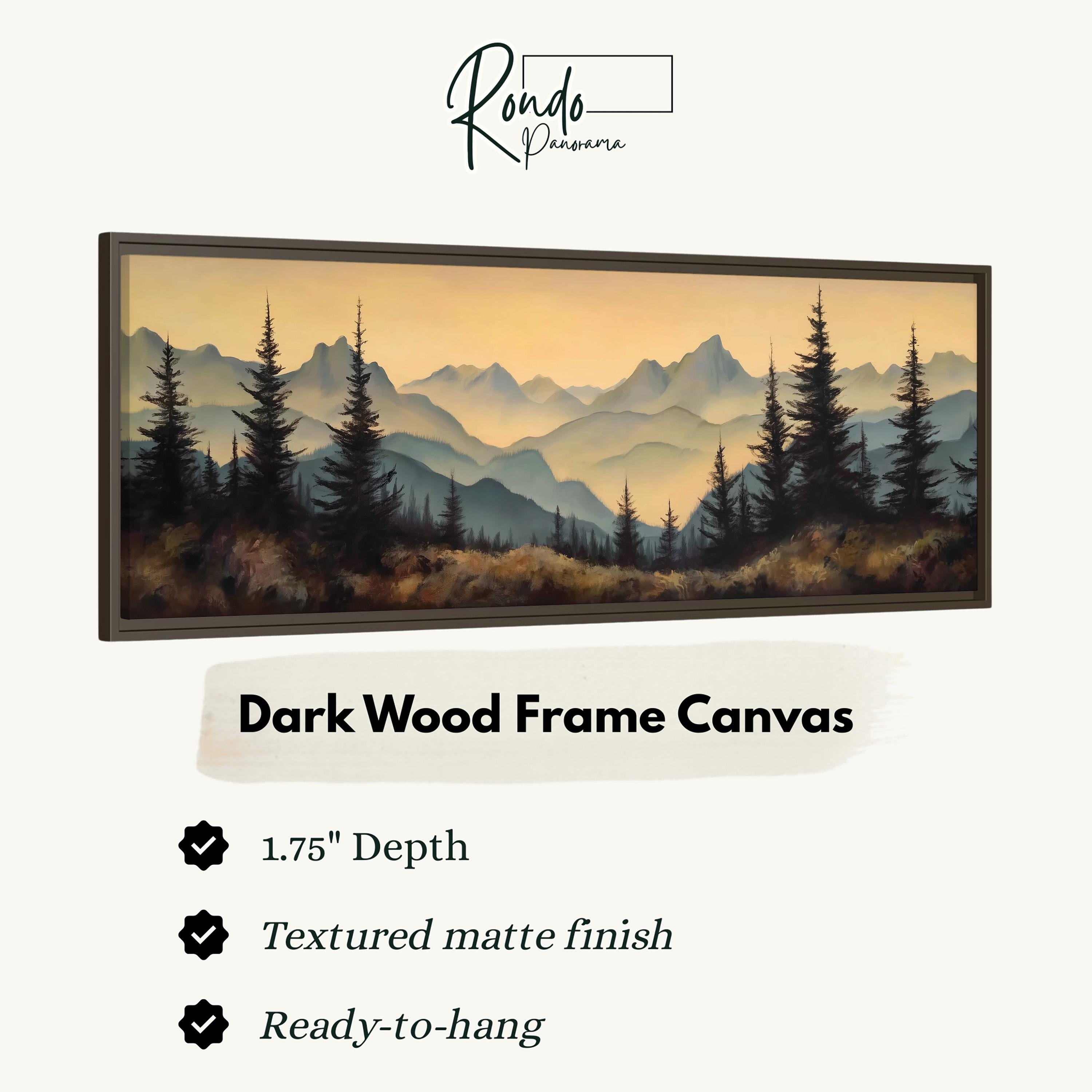 The image is a framed artwork depicting a scenic mountain landscape with pine trees and a hazy, golden sky.