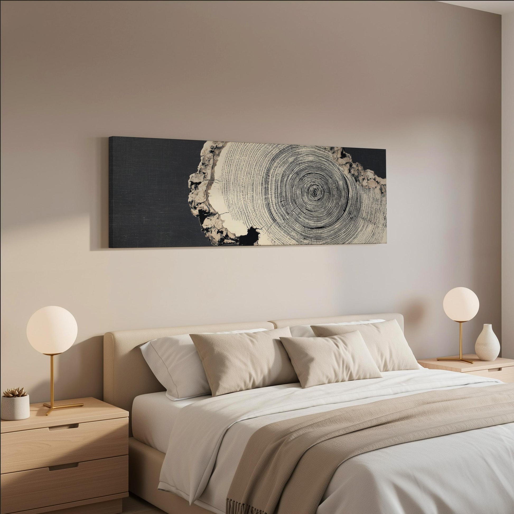 a modern bedroom with a large bed, two nightstands with lamps, and a large black and white artwork hanging on the wall above the bed.