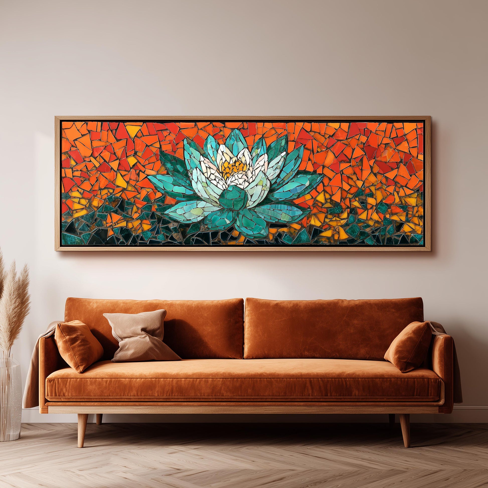 a large, vibrant mosaic artwork depicting a lotus flower, which is hanging on a wall above a brown sofa.