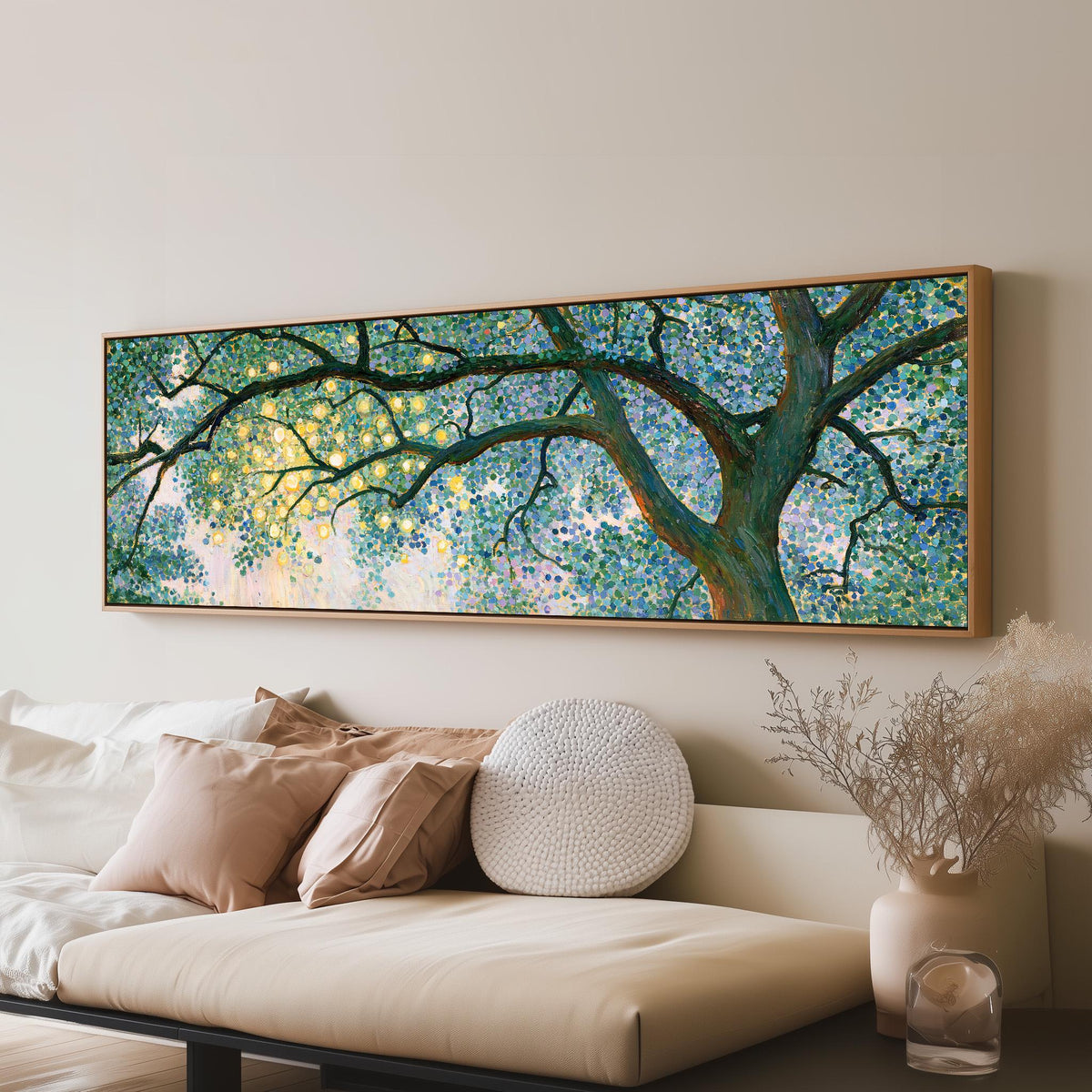 Tree canopy with golden light panoramic canvas print above a sofa in a living room