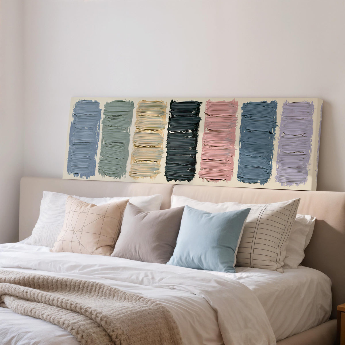 Pastel brushstroke color swatches wide panoramic canvas print above a bed in a bedroom