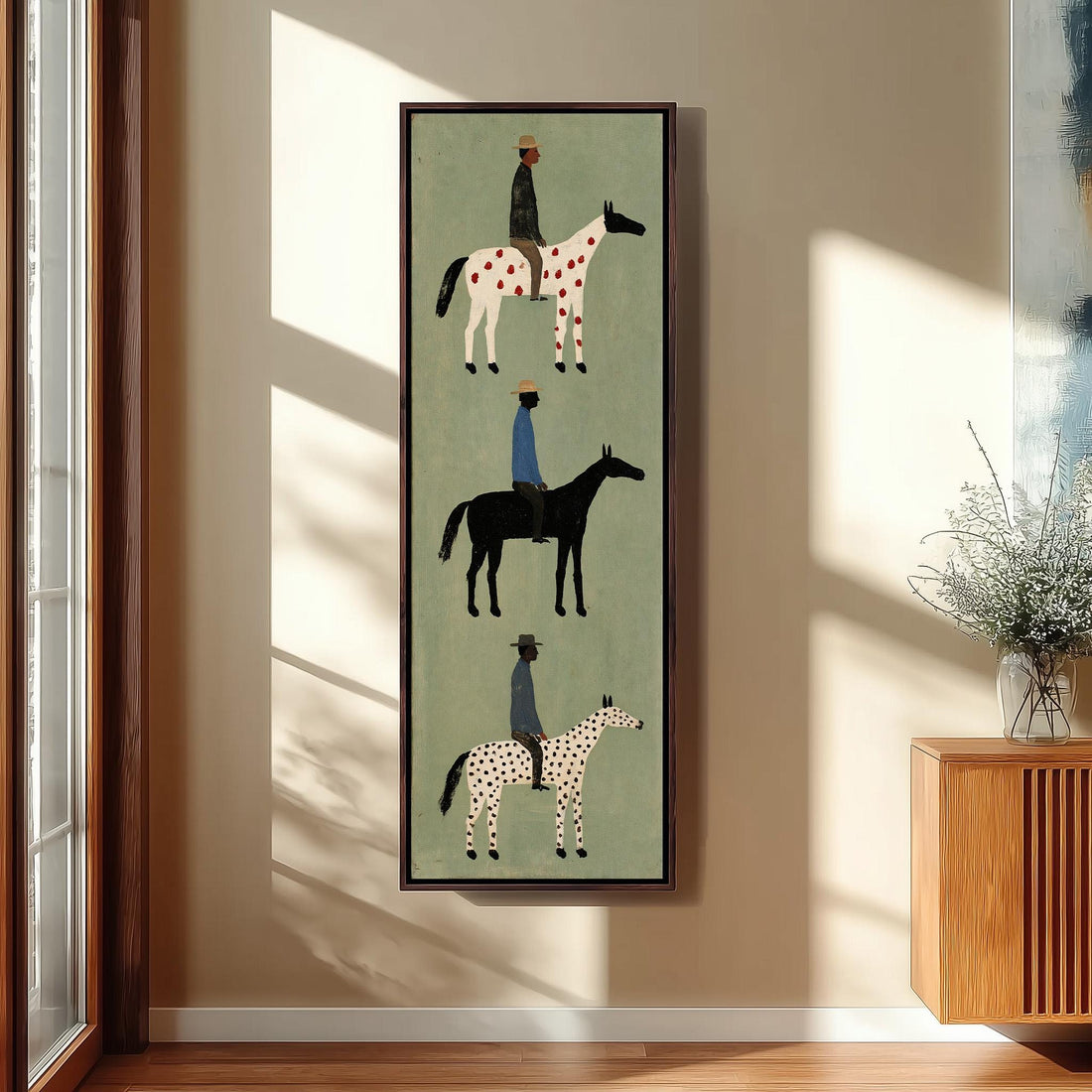 Three folk riders on spotted horses stacked vertically long vertical canvas print in a sunlit living space