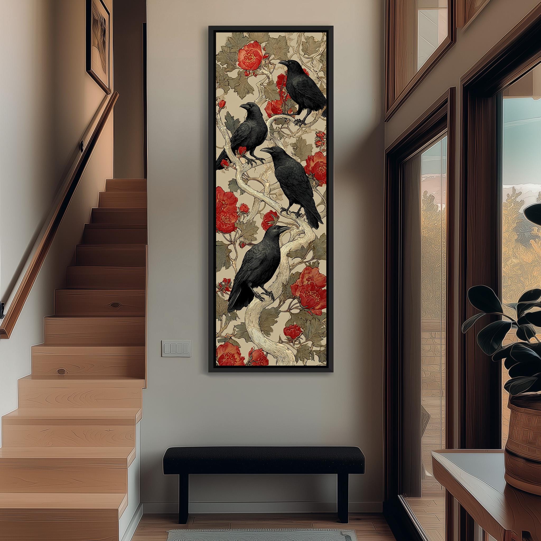 a large framed artwork of black birds perched on a branch with red flowers, hanging on the wall of a hallway.