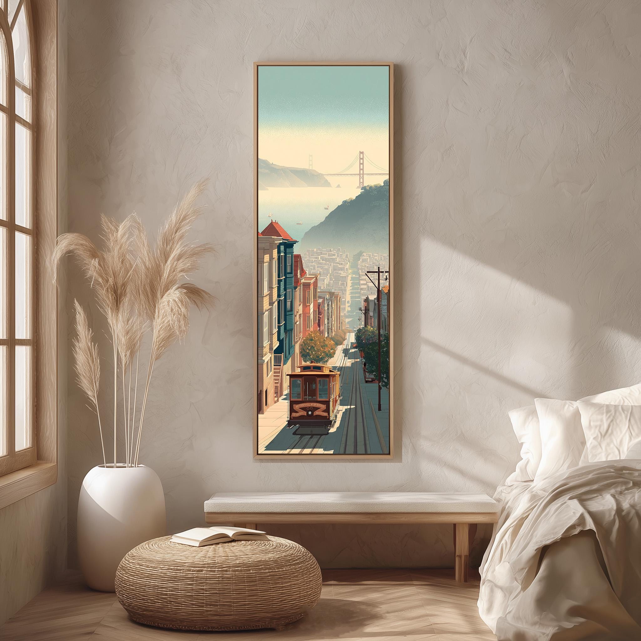a large framed painting of a cityscape with a trolley car in the foreground, hanging on a wall in a room with a bed, a potted plant, and a bench.