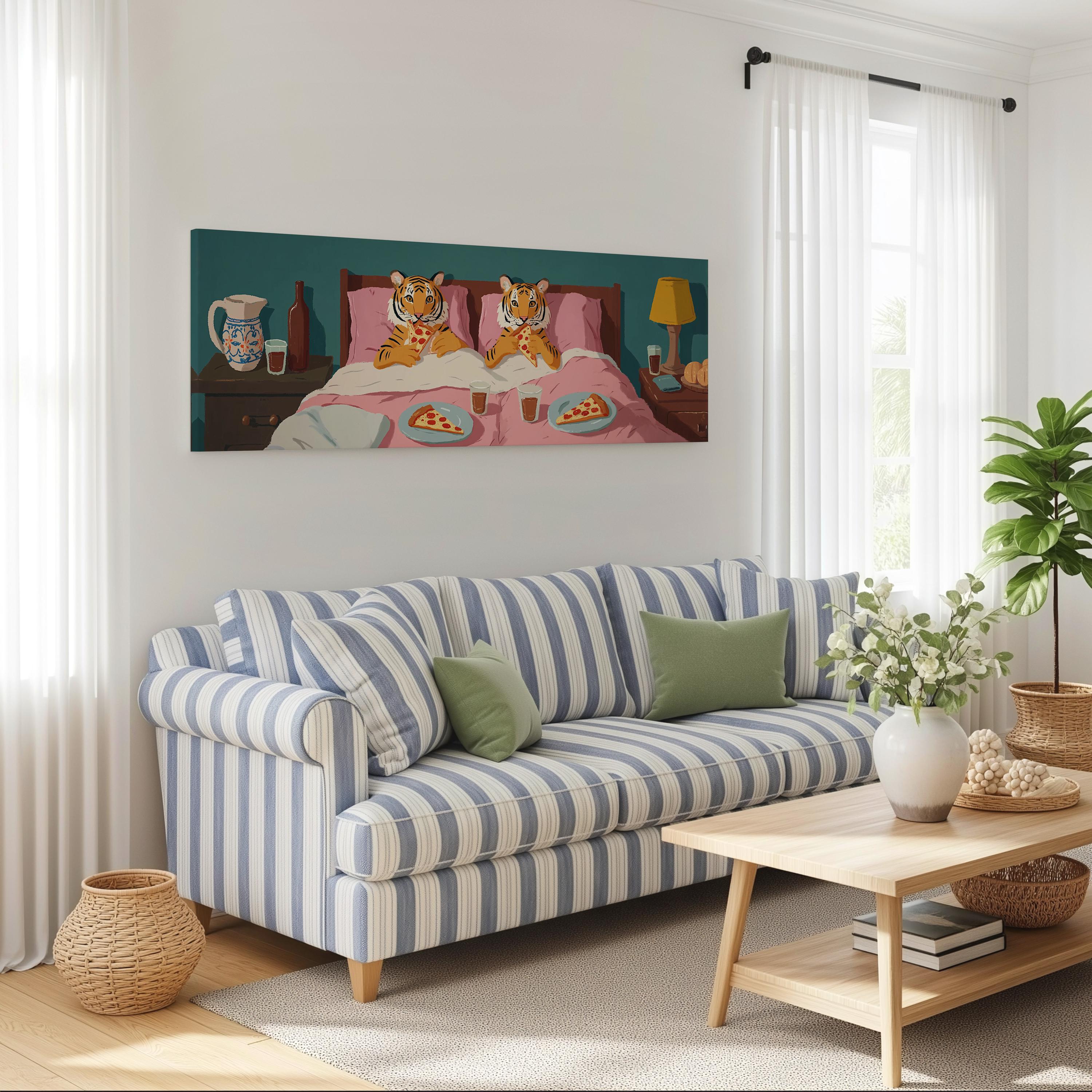 a cozy living room with a striped blue and white sofa, a wooden coffee table, and a large painting of two tigers sharing a pizza on a bed.