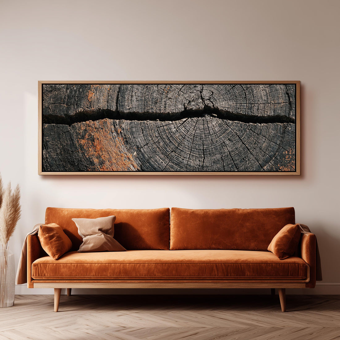 Cracked weathered wood ring long horizontal canvas print above a sofa in a living room