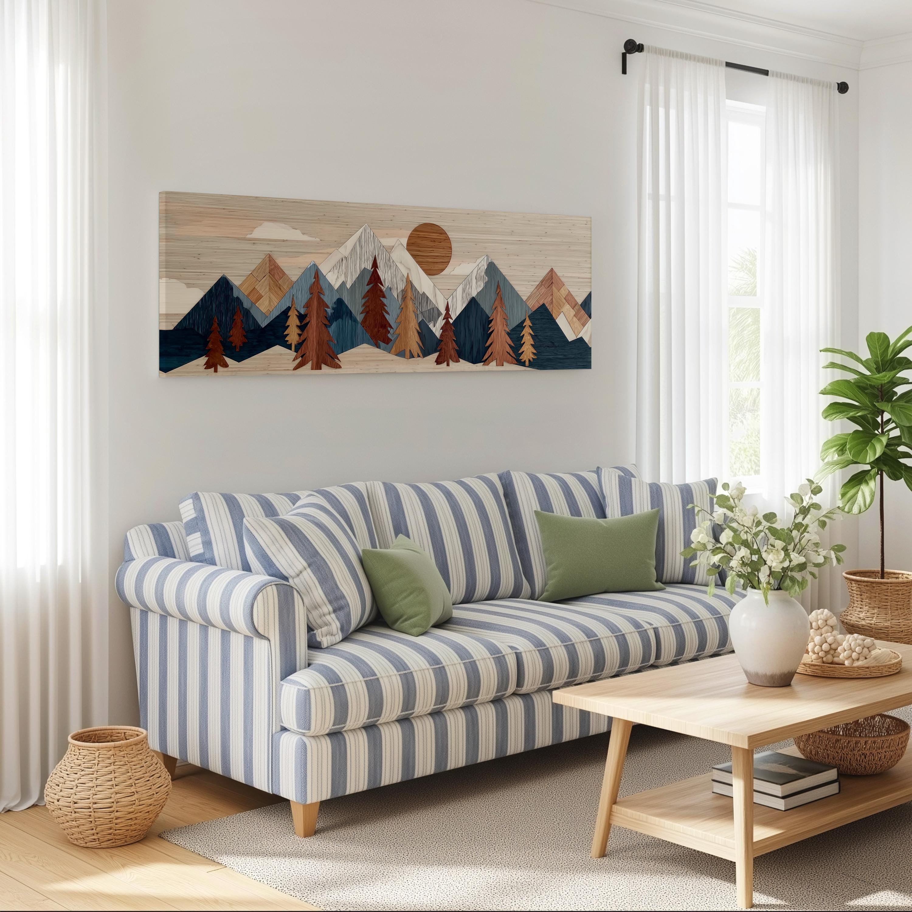 a cozy living room with a striped blue and white sofa, a wooden coffee table, and a large landscape painting hanging on the wall above the sofa.