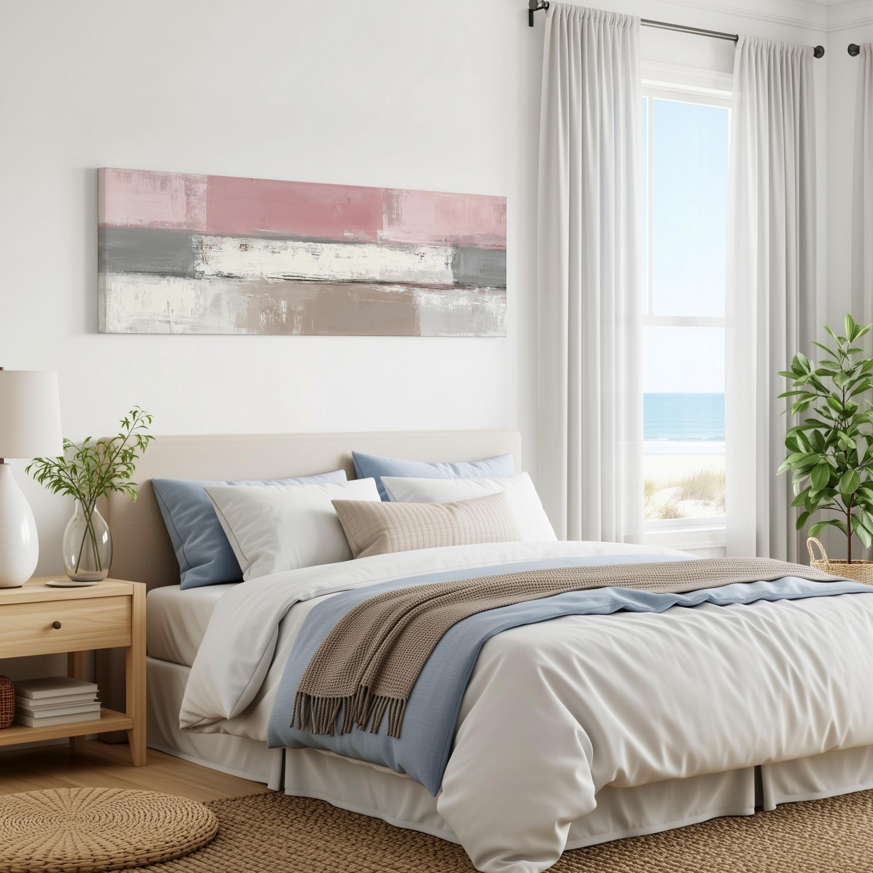 a serene and modern bedroom with a large bed, a nightstand, and a painting on the wall. The room has a neutral color palette with white walls, a beige headboard, and a large window that offers a view of the ocean. The bed is adorned with a gray and white blanket, and the room is decorated with various plants and other accessories, creating a cozy and inviting atmosphere.