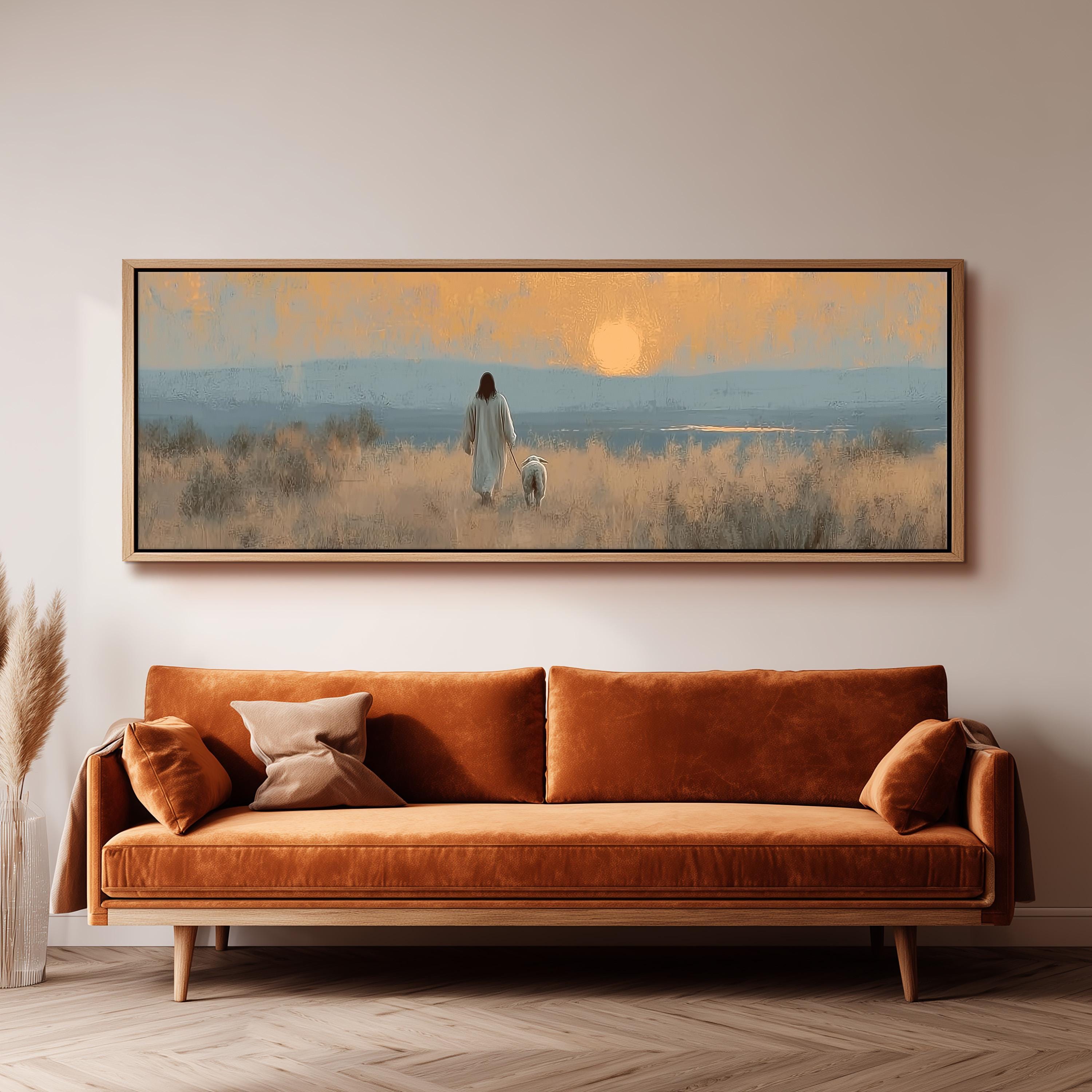 a large, rectangular painting hanging on a wall above a brown sofa. The painting depicts a person walking a dog in a field with a sunset in the background.