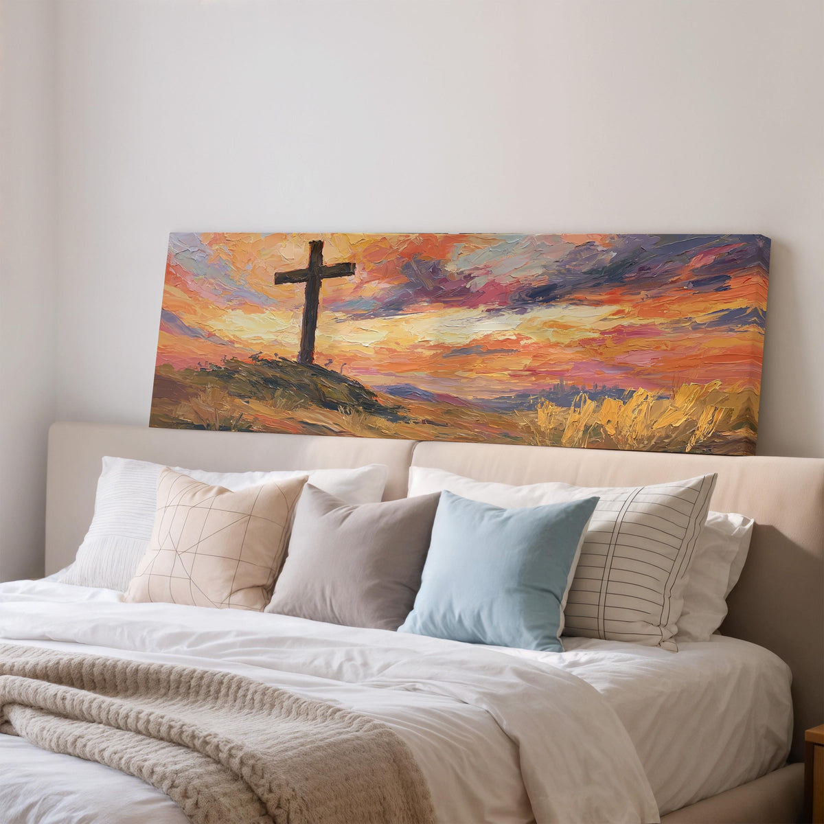 Cross on a hill at sunset wide panoramic canvas print above a bed in a bedroom