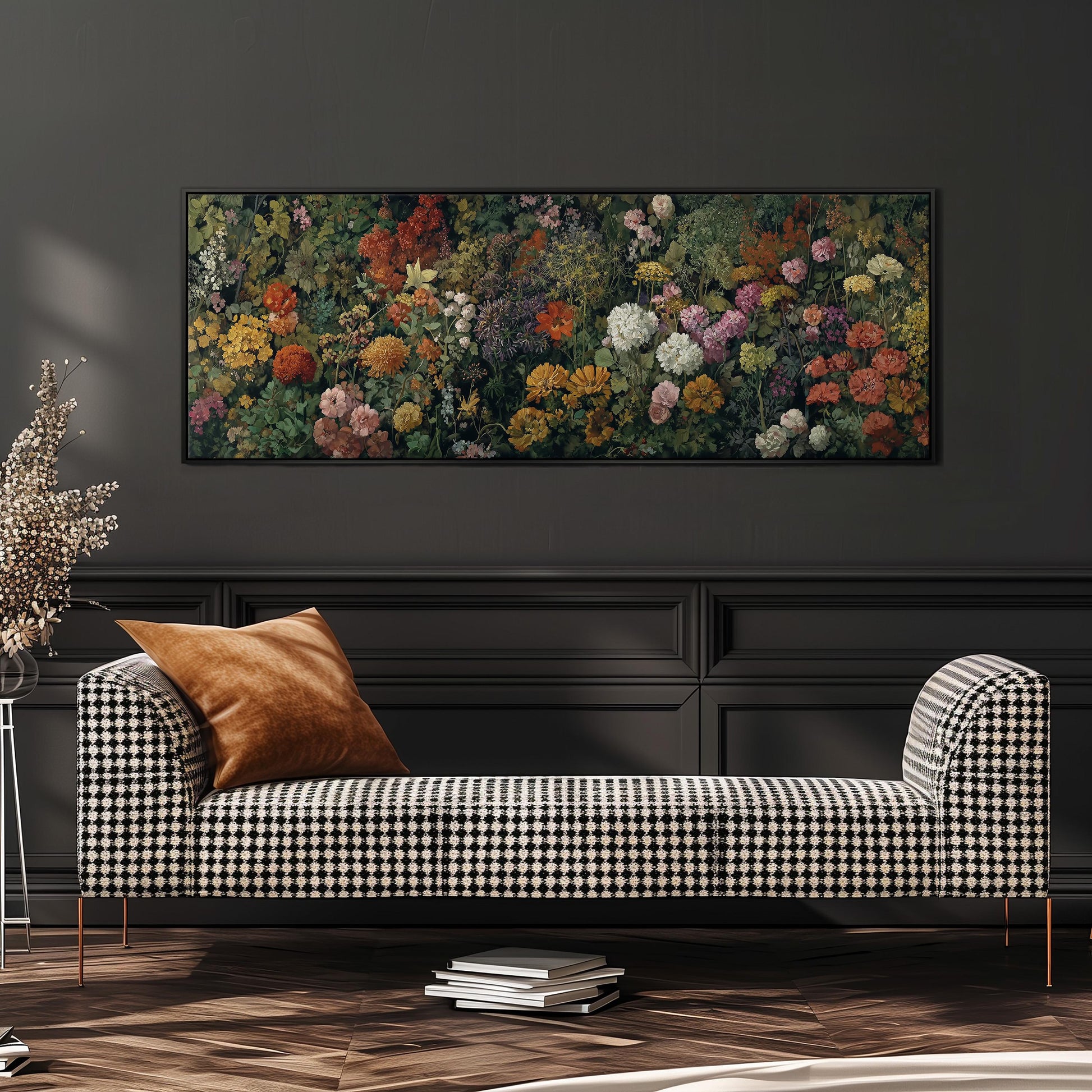 a black and white checkered sofa with a brown throw pillow, set against a dark wall with a large floral painting hanging above it.