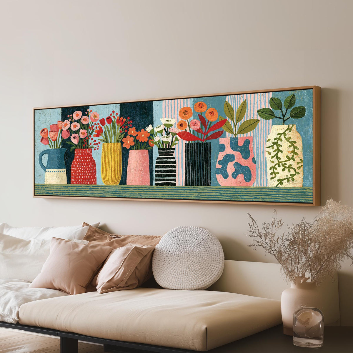 Row of folk art flower vases panoramic canvas print above a sofa in a living room