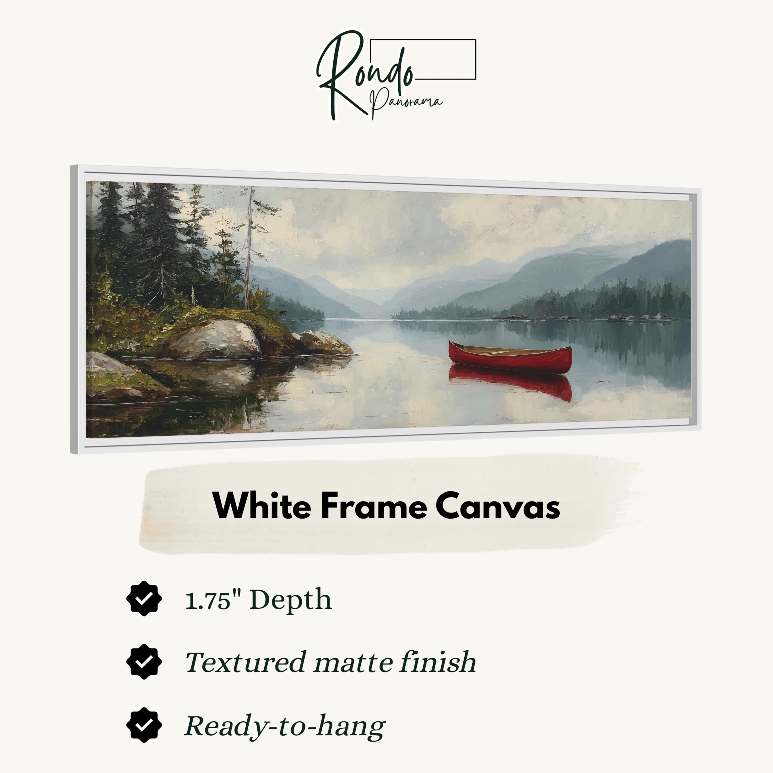 The image is a white frame canvas depicting a serene landscape with a red canoe on a lake surrounded by trees and mountains.