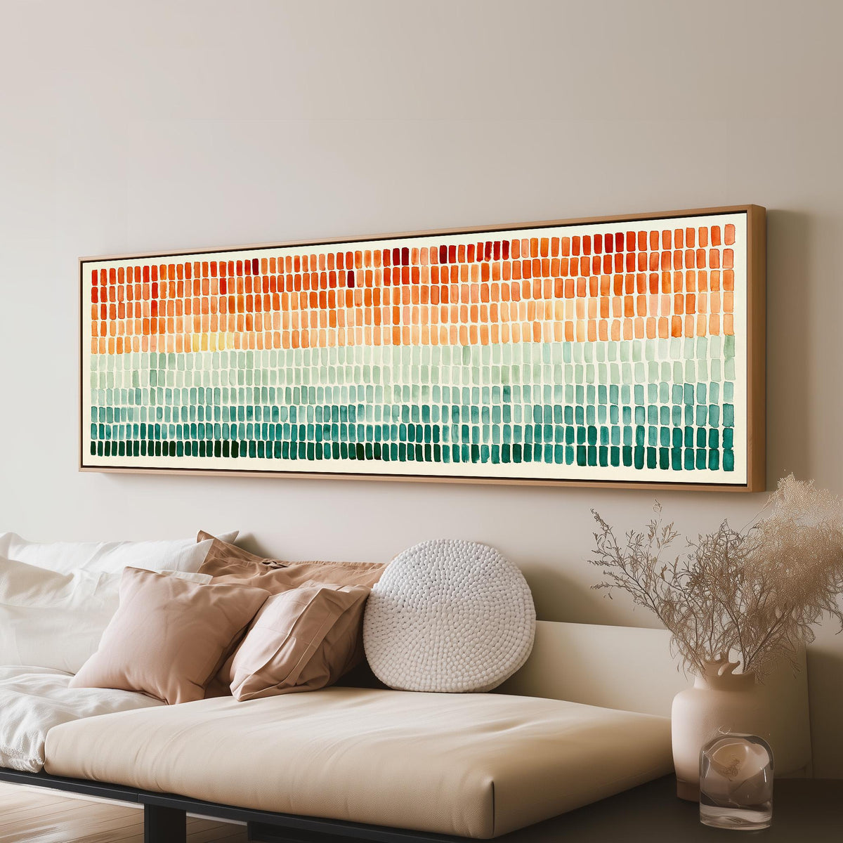 Brushmarks fading from orange to teal panoramic canvas print above a sofa in a living room