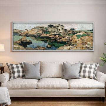 a large framed painting of a landscape with a house and a body of water, hanging on a wall above a white sofa with patterned throw pillows.