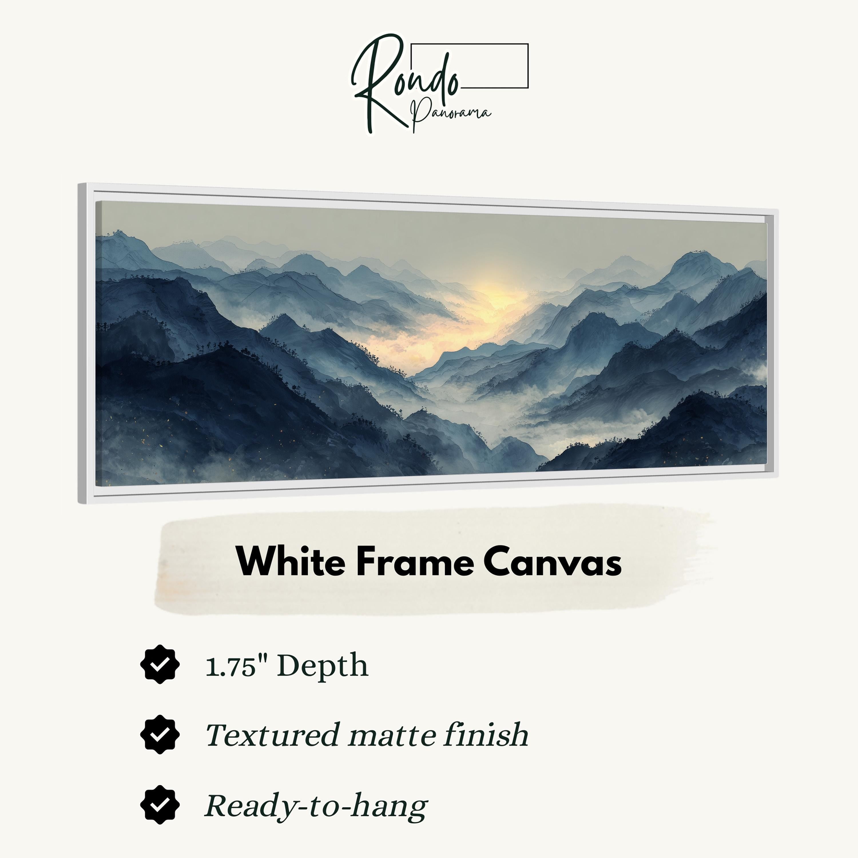 The image is a white frame canvas depicting a mountainous landscape with a hazy, misty atmosphere.