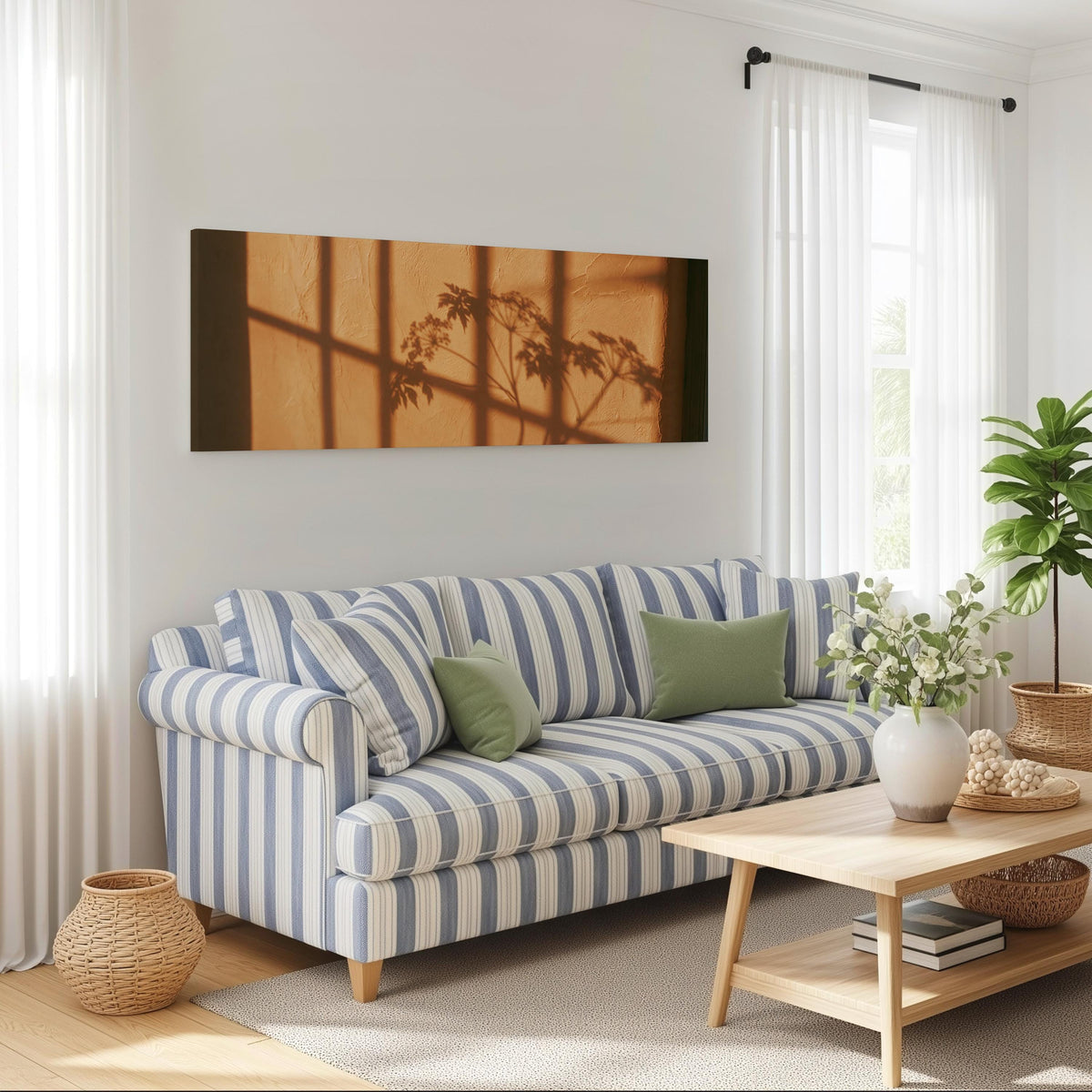 Plant and window shadows on a terracotta wall long horizontal canvas print above a striped sofa in a coastal living room