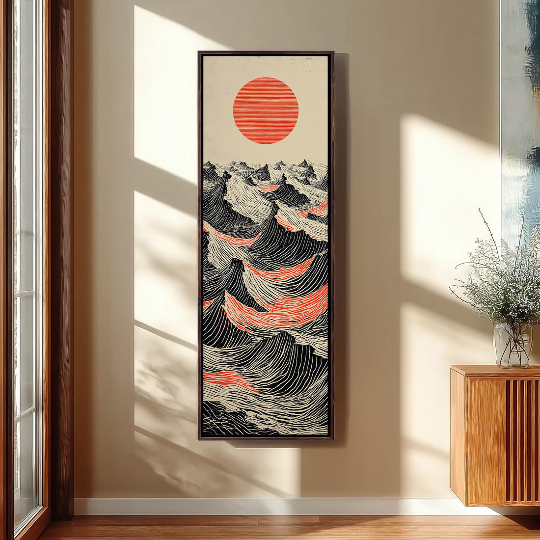 Red sun over ink waves long vertical canvas print in a sunlit living space